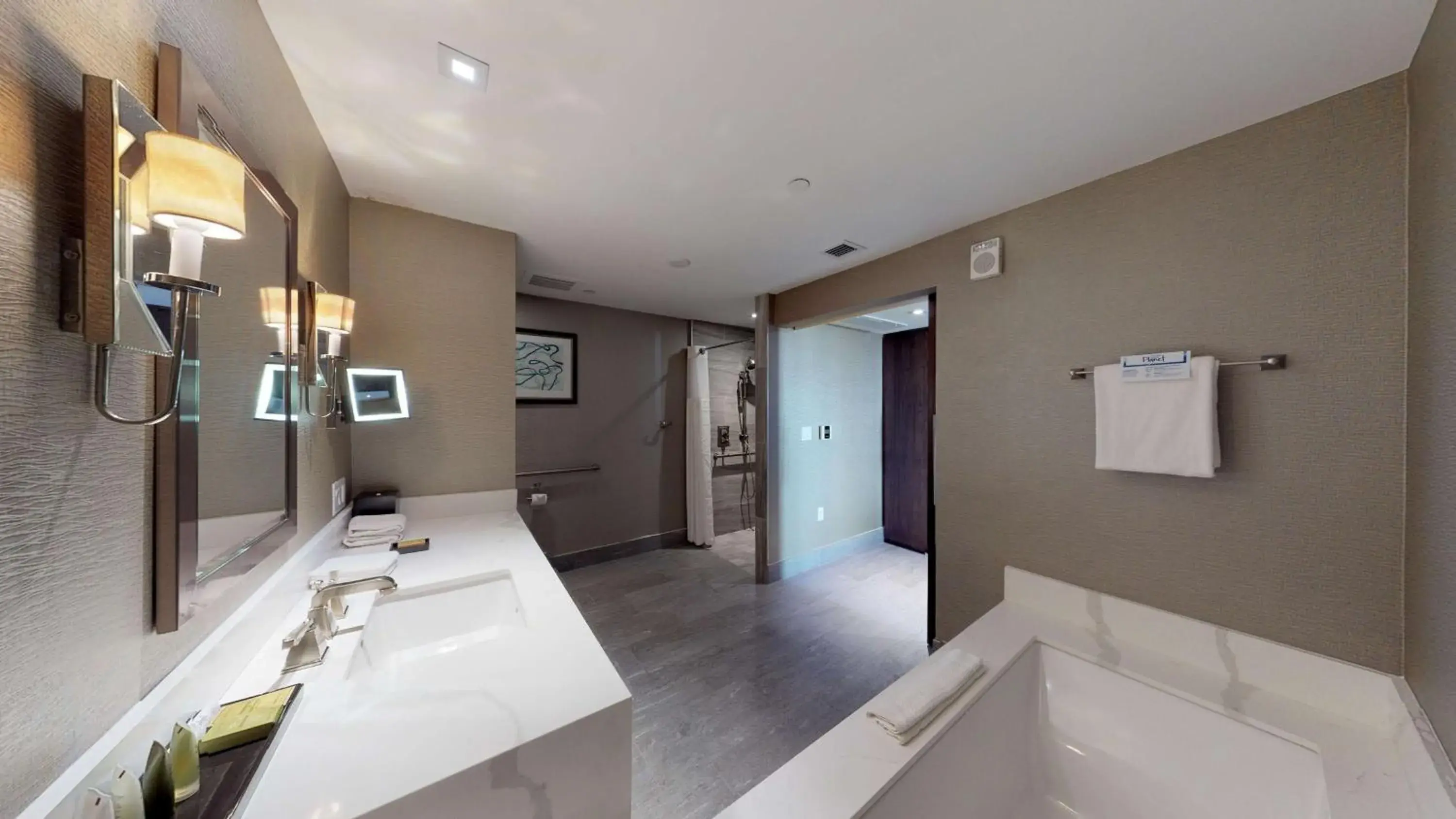 Bathroom, Bed in Hilton Marco Island Beach Resort and Spa Bathroom, Bed in Hilton Marco Island Beach Resort and Spa