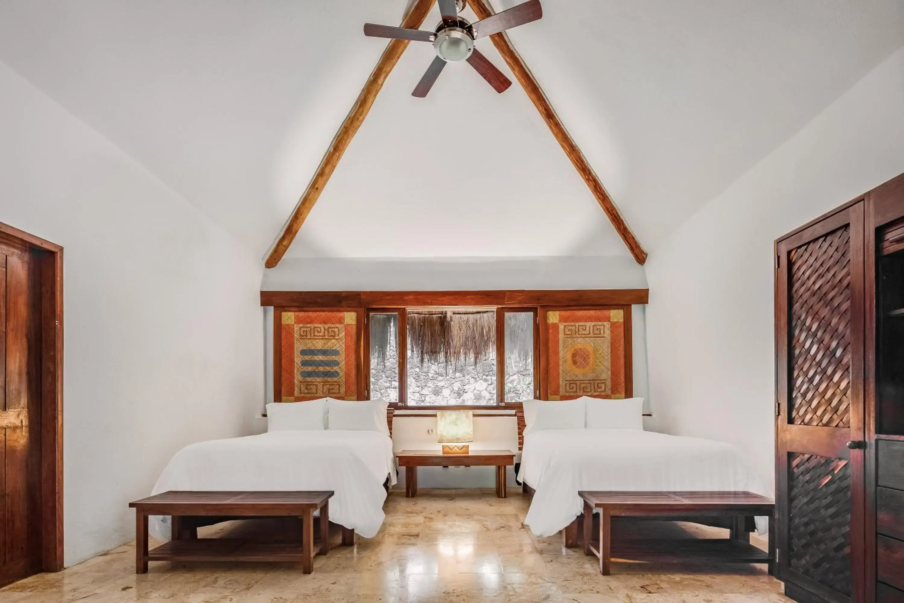 Photo of the whole room, Bed in The Explorean Selva Maya Kohunlich Photo of the whole room, Bed in The Explorean Selva Maya Kohunlich