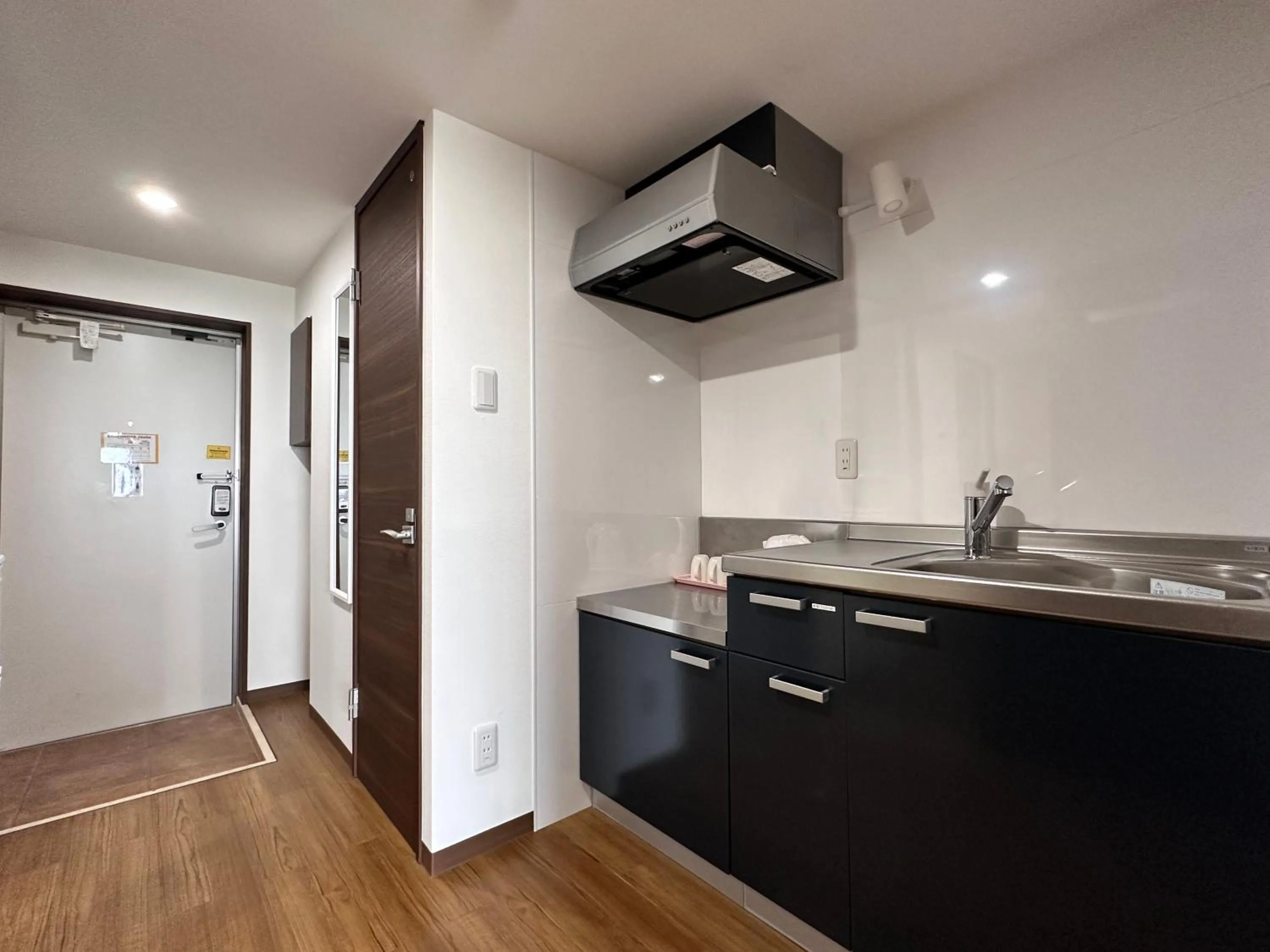 Kitchen or kitchenette in Hotel Miyakojima