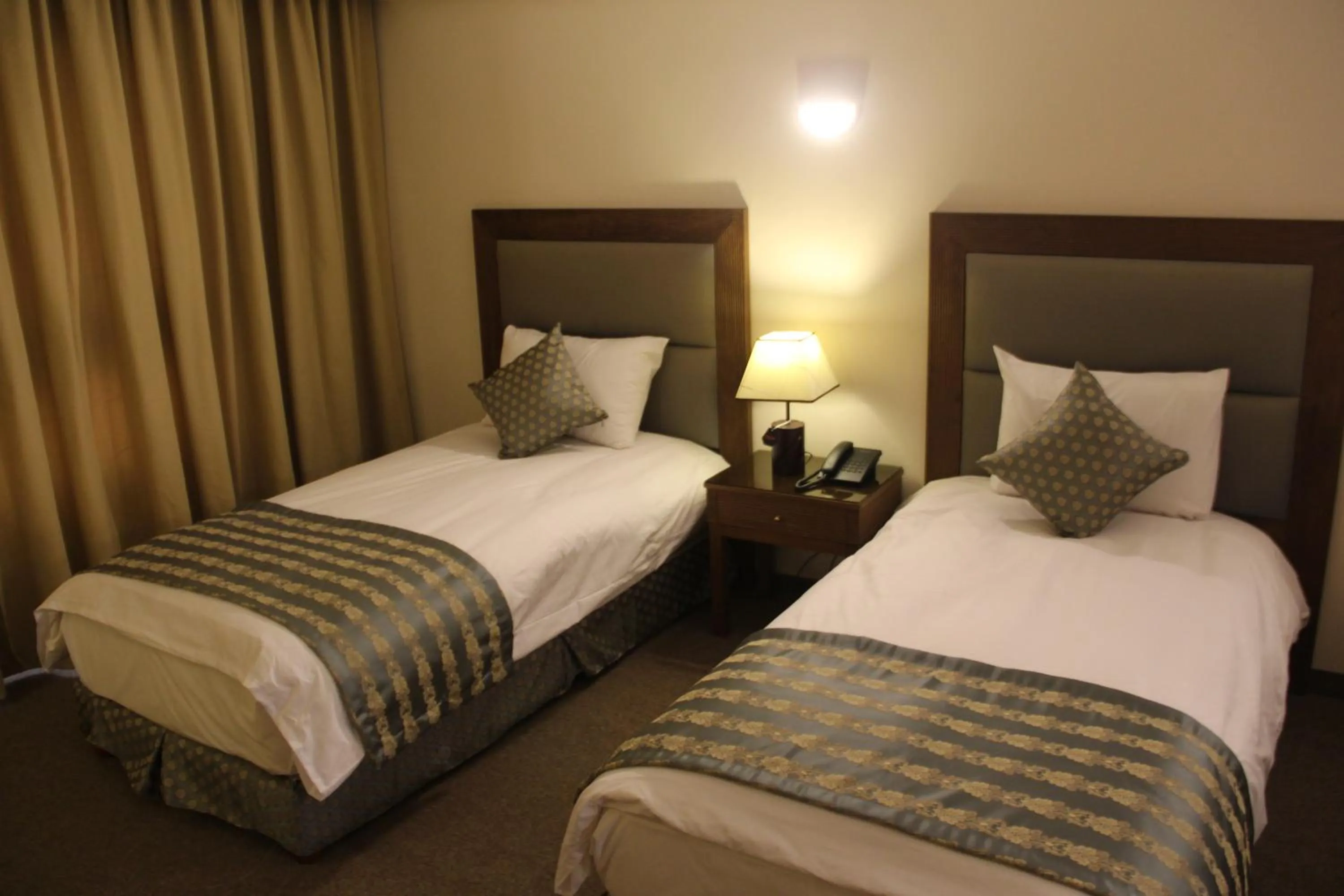 Bed in Saray Hotel Amman