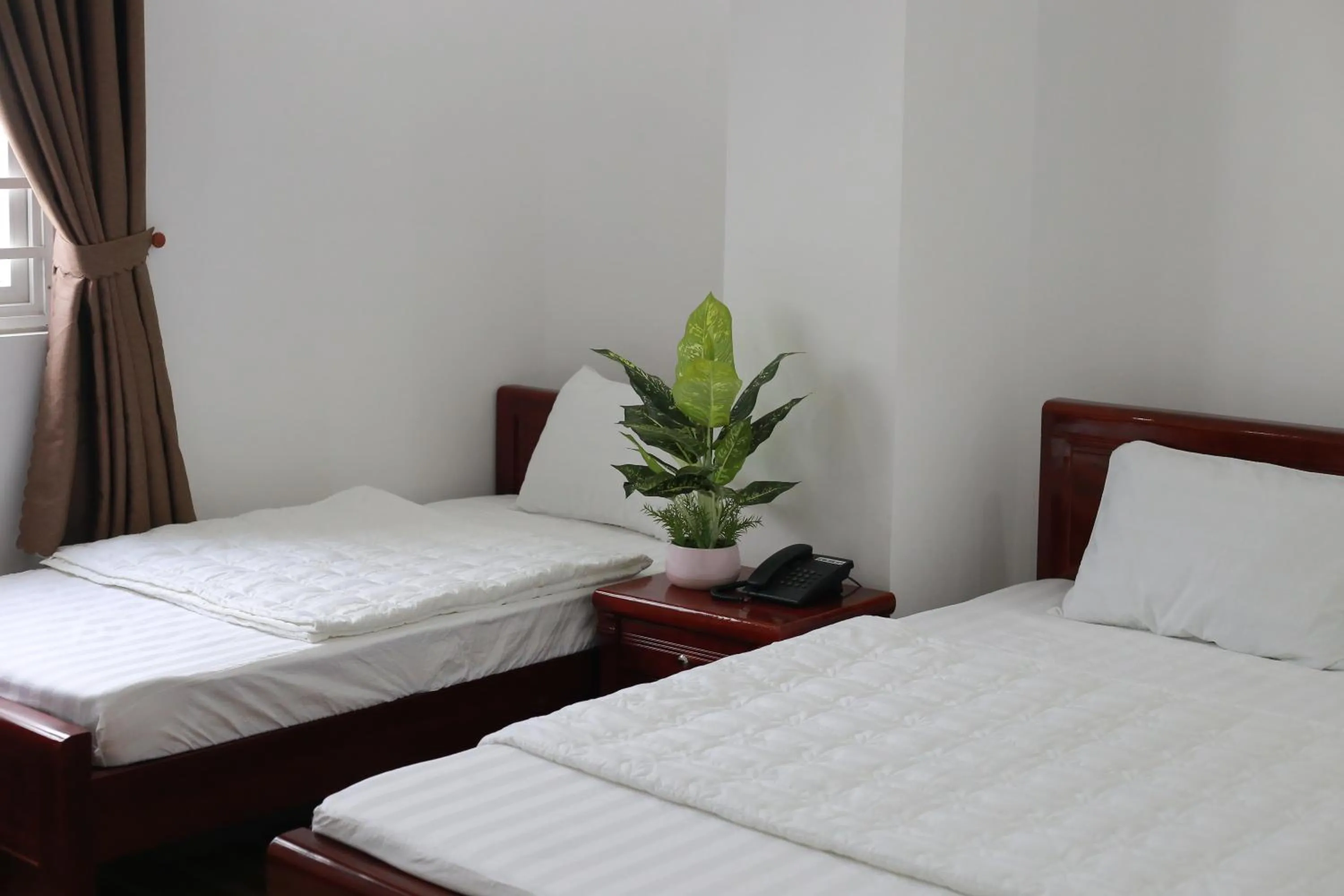 Bed in Lavender Hotel