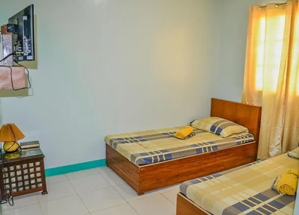 Bed in Terraza de Nino Resort