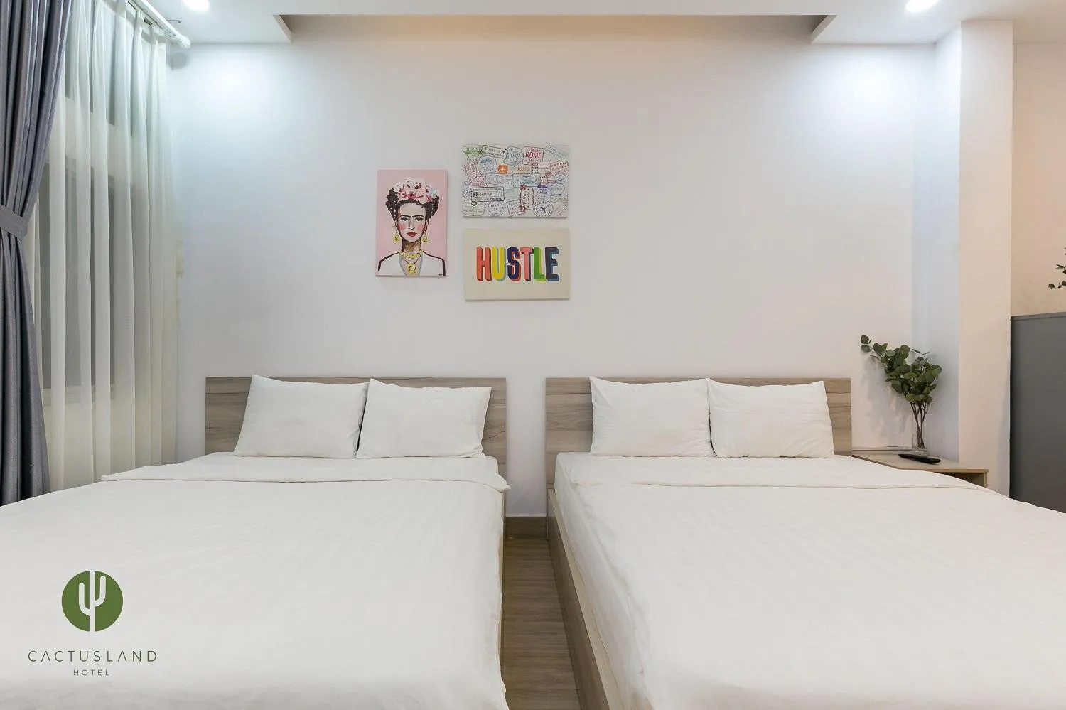 Bed in Cactusland Hotel & Apartment