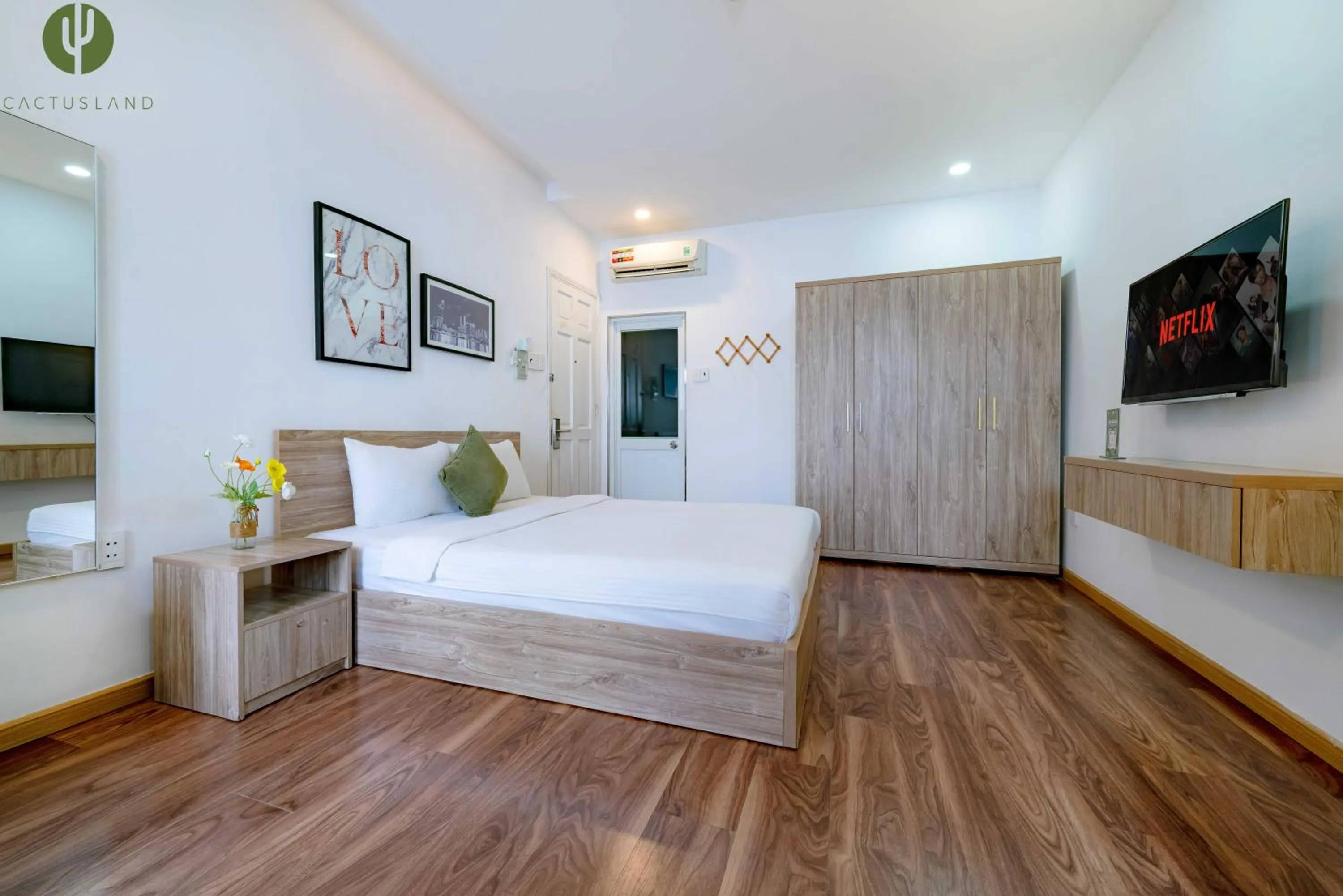 Bed in Cactusland Hotel & Apartment