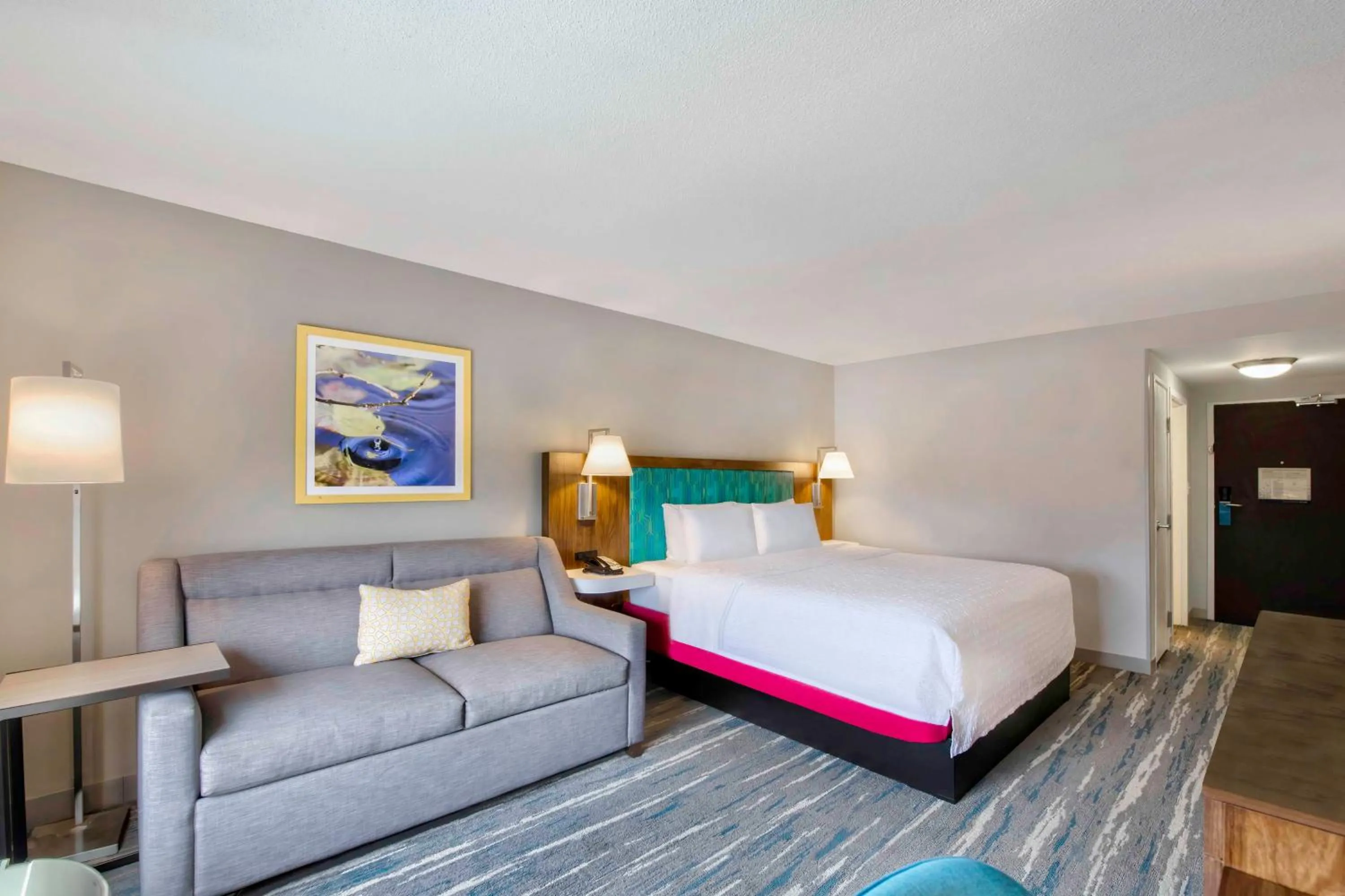 Living room, Bed in Hampton Inn & Suites Jackson