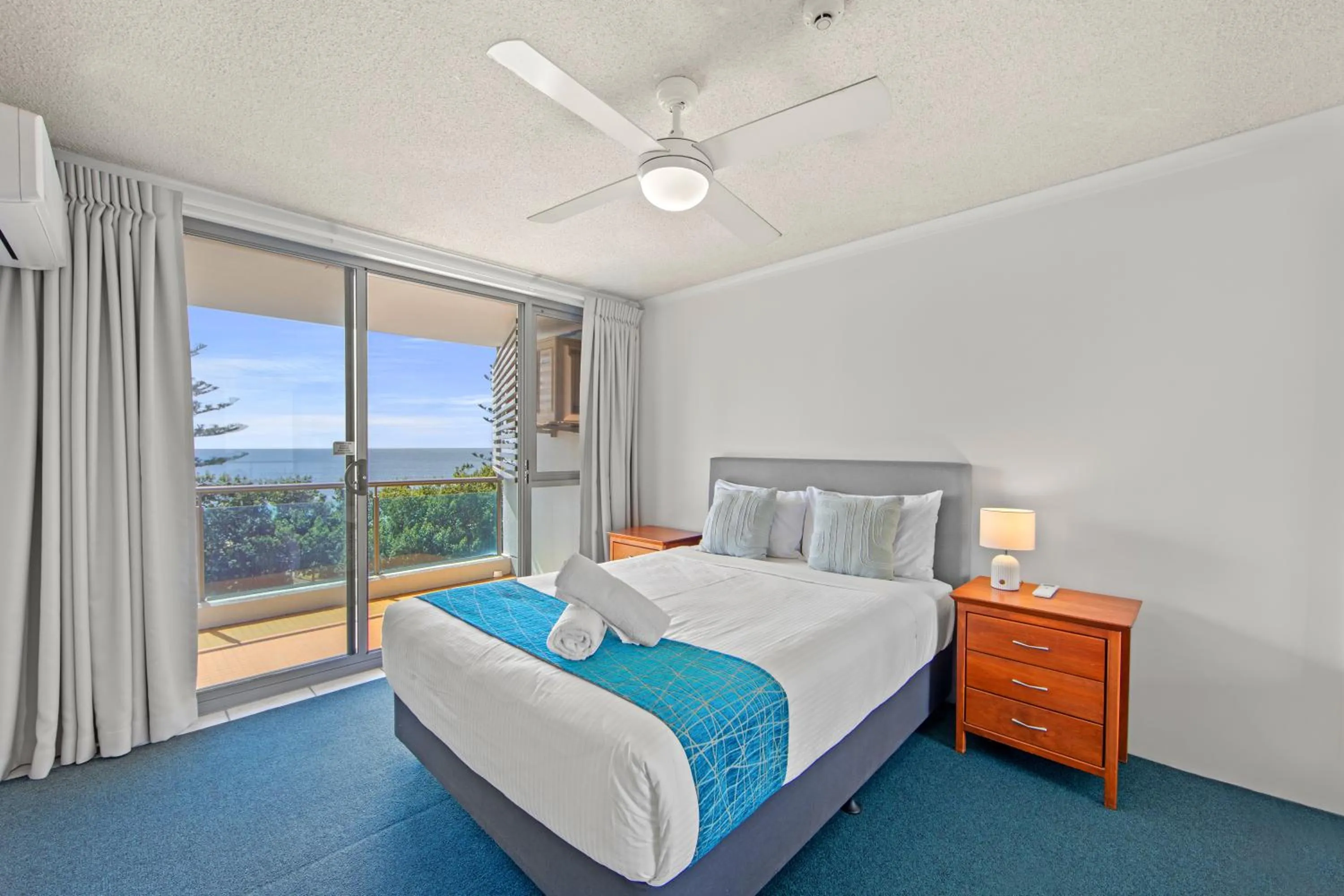 Bed in Northwind Beachfront Apartments
