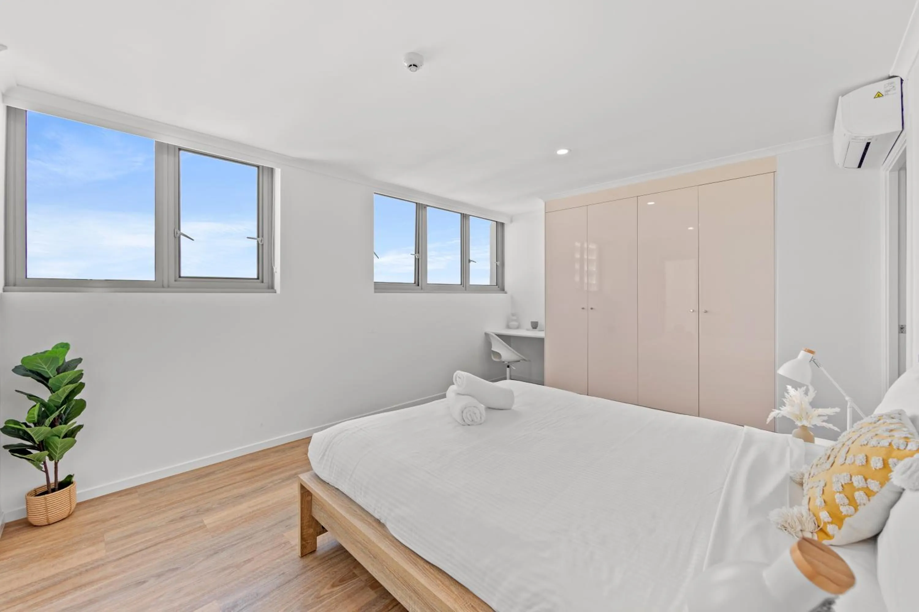 Bed in Northwind Beachfront Apartments