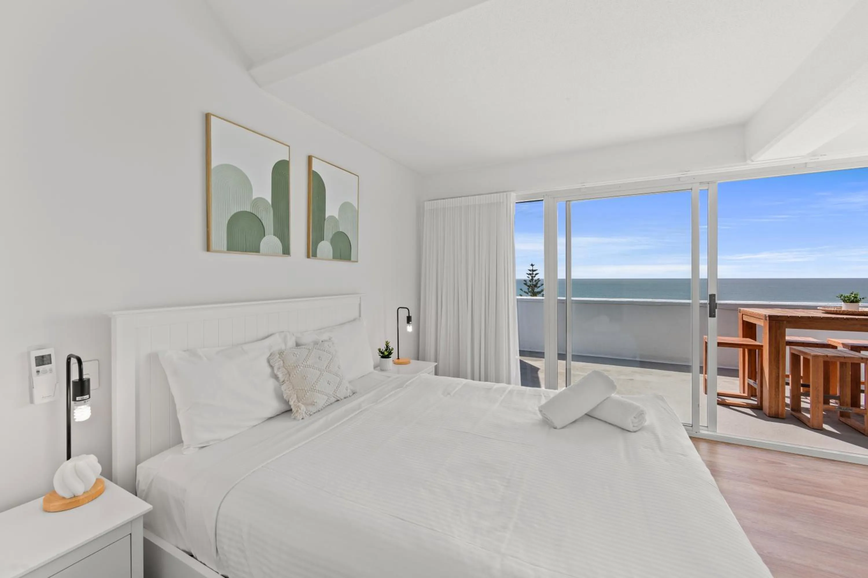 Bed in Northwind Beachfront Apartments