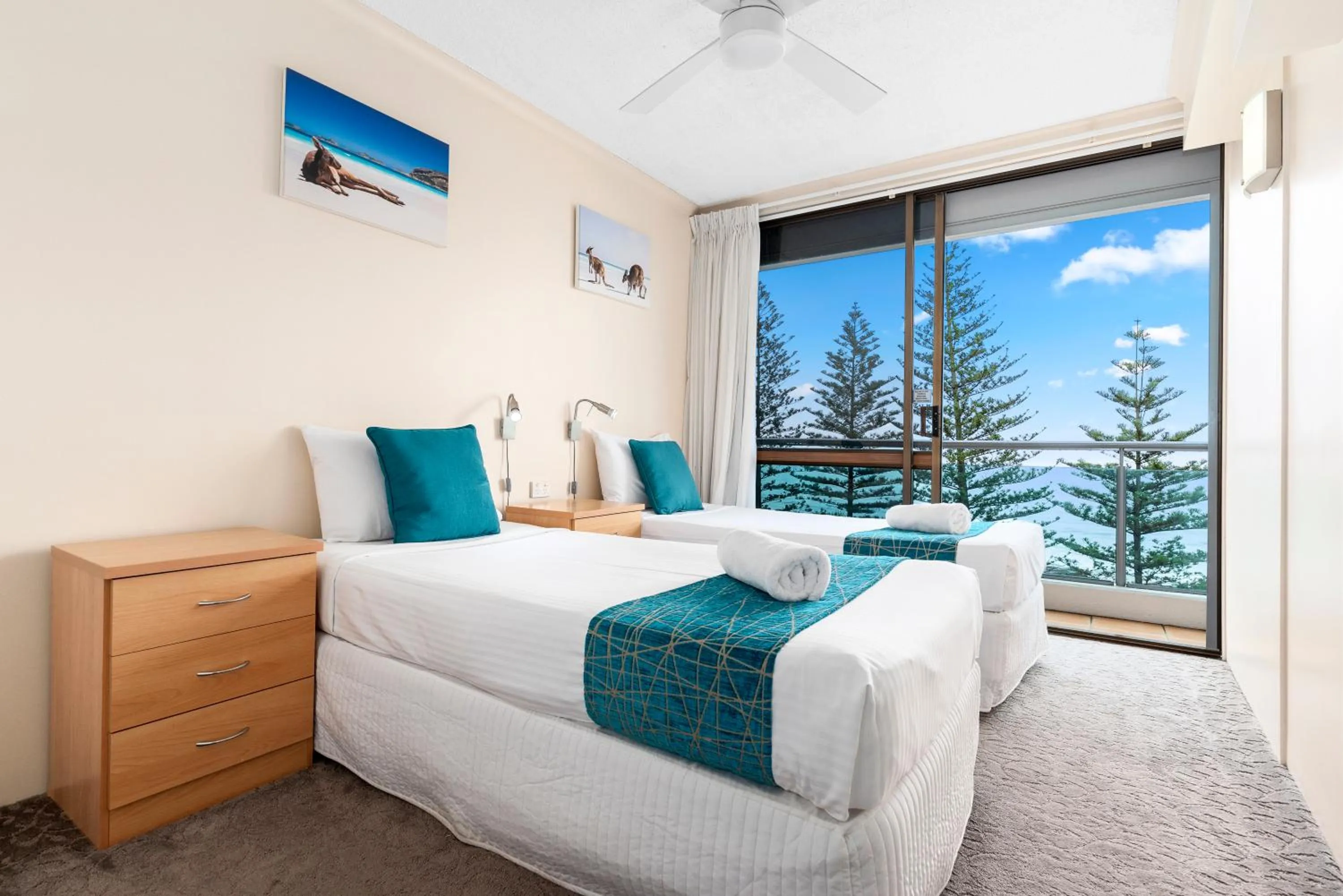 Bed in Northwind Beachfront Apartments