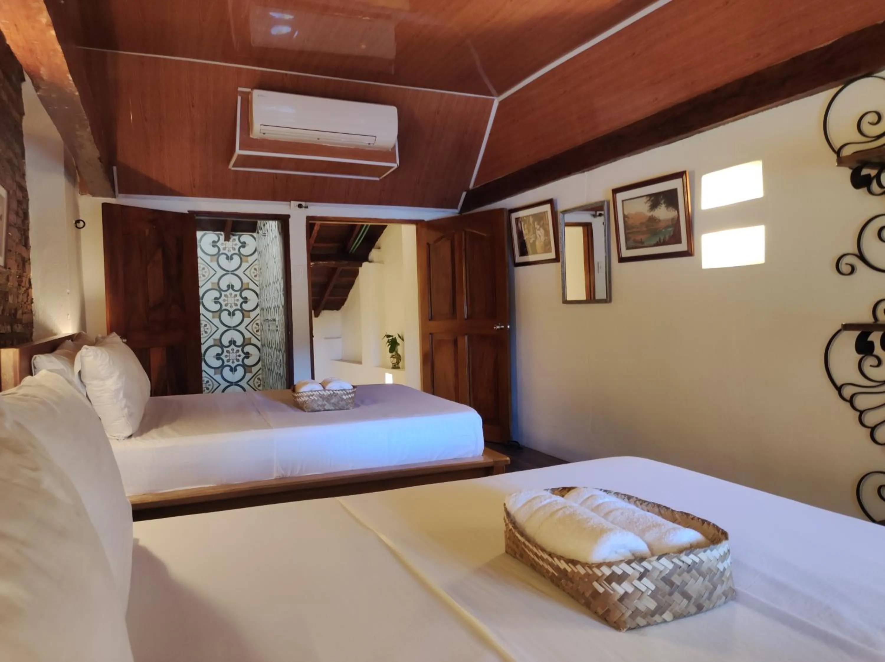 Bed in HOTEL NIETO MOMPOX, ubicado en el corazón del centro histórico, frente al rio magdalena en zona de malecón
