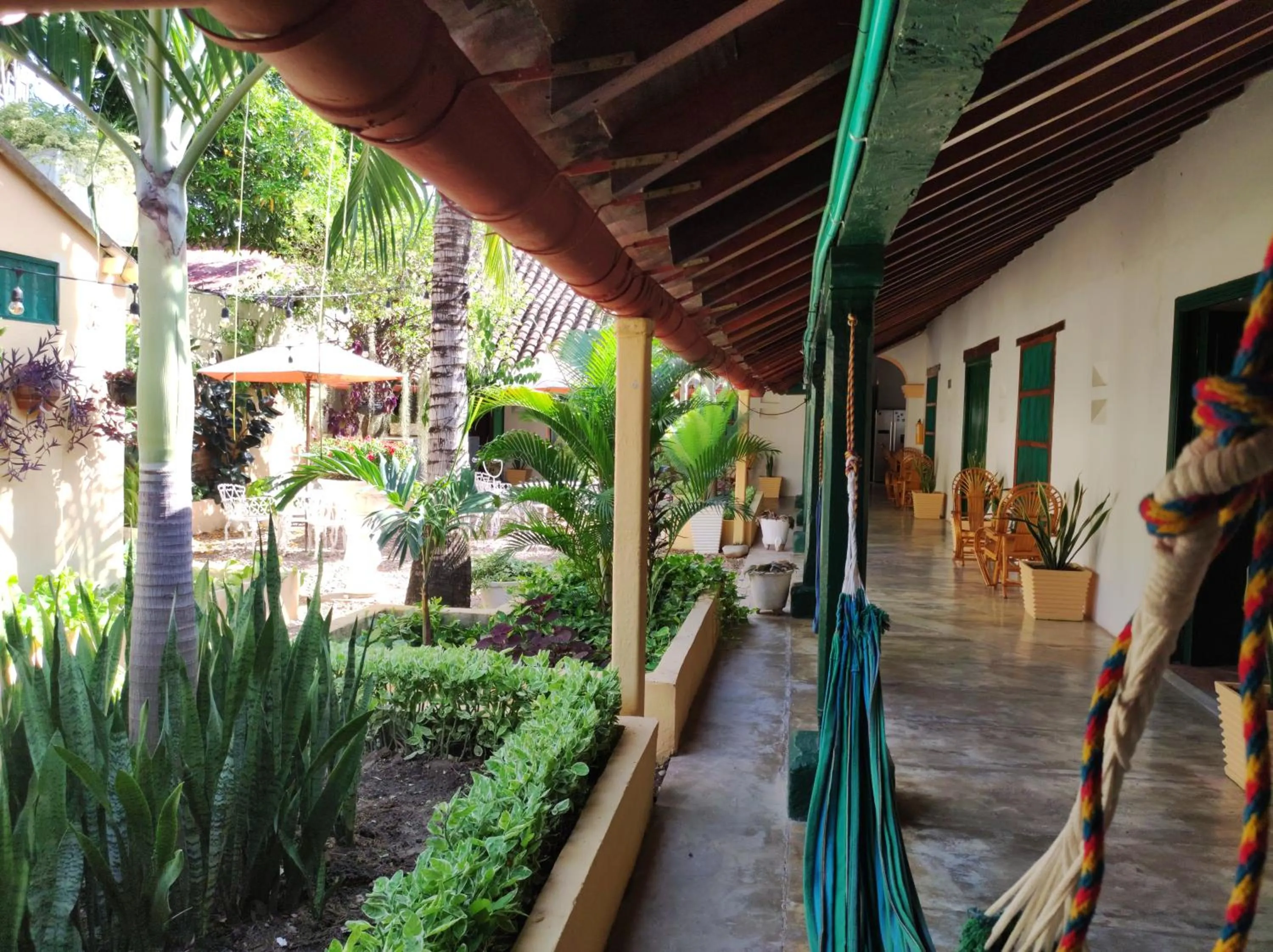 Garden in HOTEL NIETO MOMPOX, ubicado en el corazón del centro histórico, frente al rio magdalena en zona de malecón