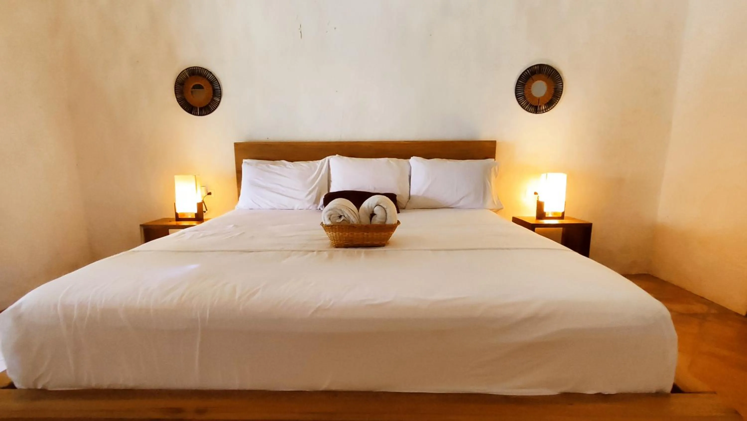Bed in HOTEL NIETO MOMPOX, ubicado en el corazón del centro histórico, frente al rio magdalena en zona de malecón