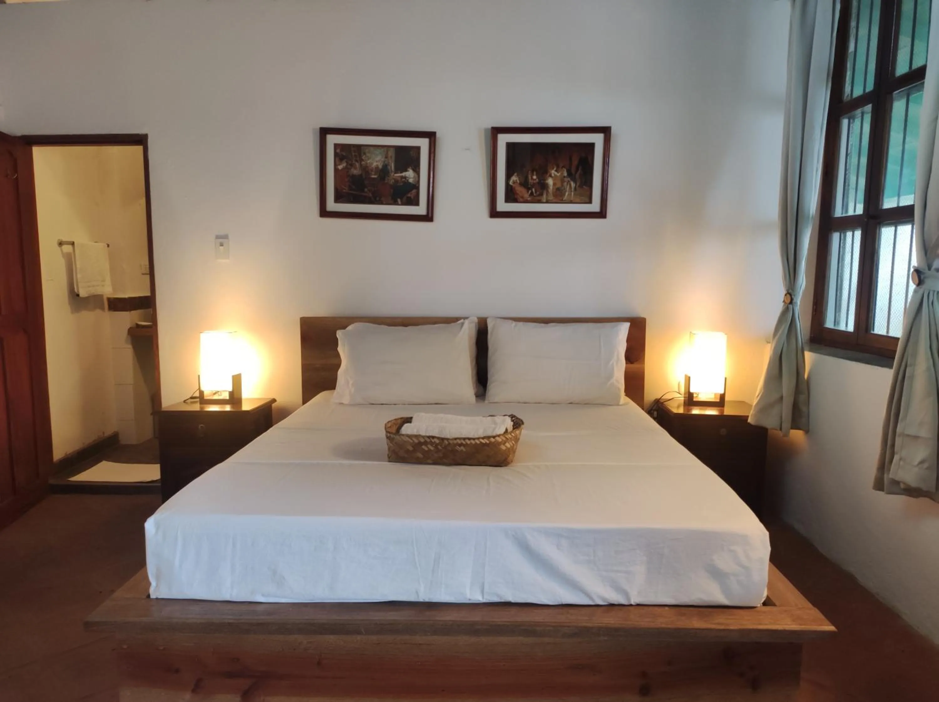 Bed in HOTEL NIETO MOMPOX, ubicado en el corazón del centro histórico, frente al rio magdalena en zona de malecón