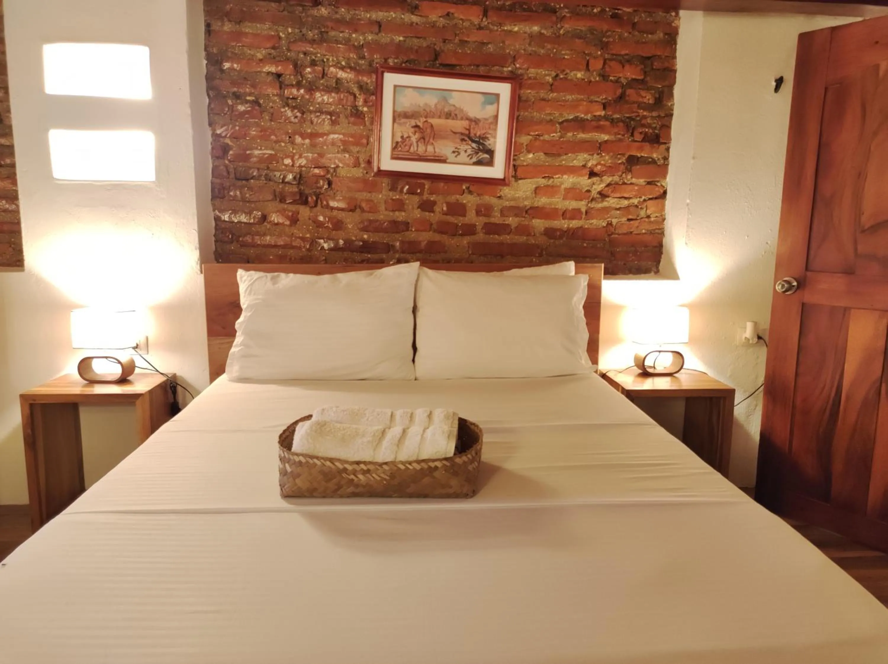 Bed in HOTEL NIETO MOMPOX, ubicado en el corazón del centro histórico, frente al rio magdalena en zona de malecón