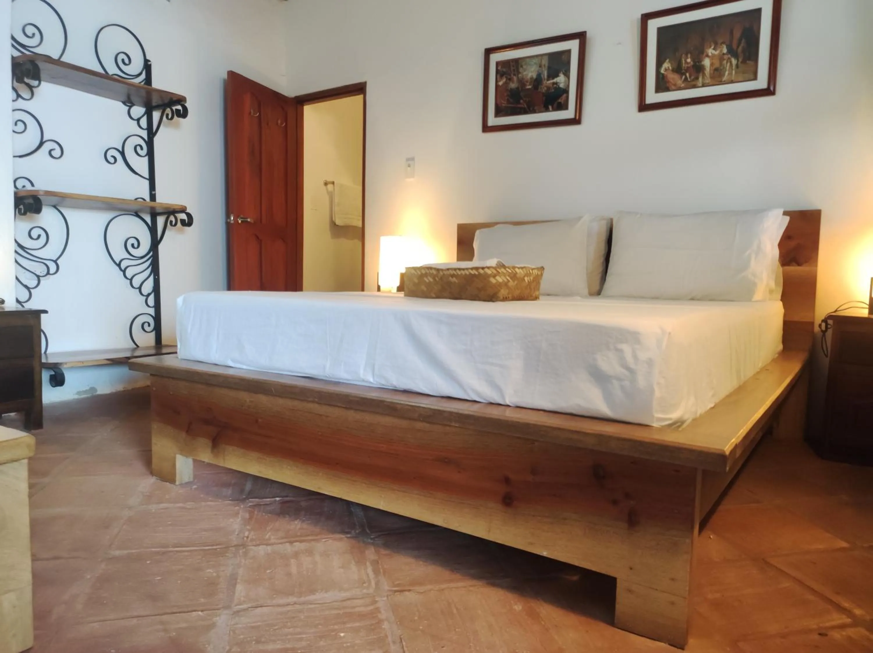 Bed in HOTEL NIETO MOMPOX, ubicado en el corazón del centro histórico, frente al rio magdalena en zona de malecón