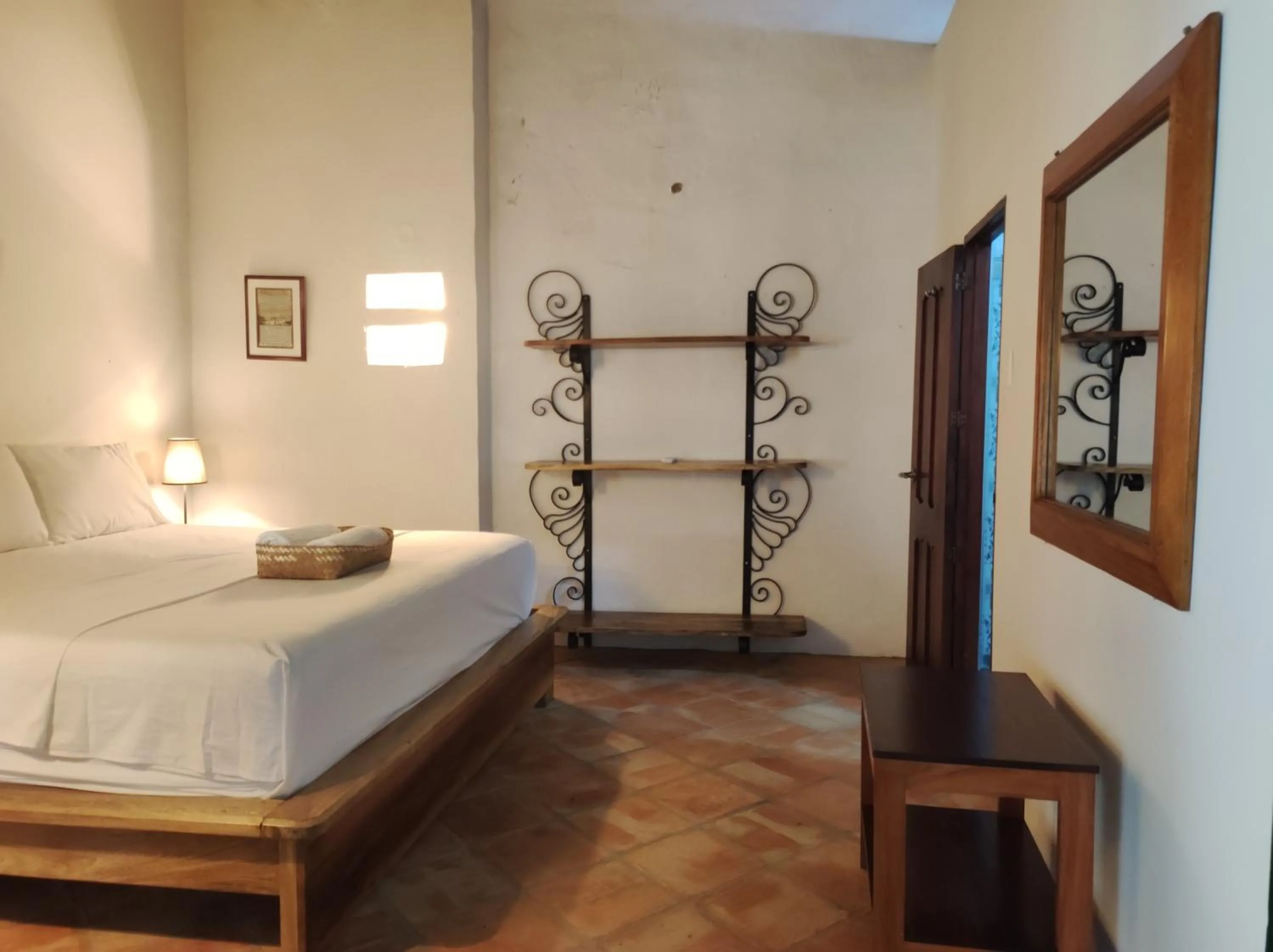 Bed in HOTEL NIETO MOMPOX, ubicado en el corazón del centro histórico, frente al rio magdalena en zona de malecón