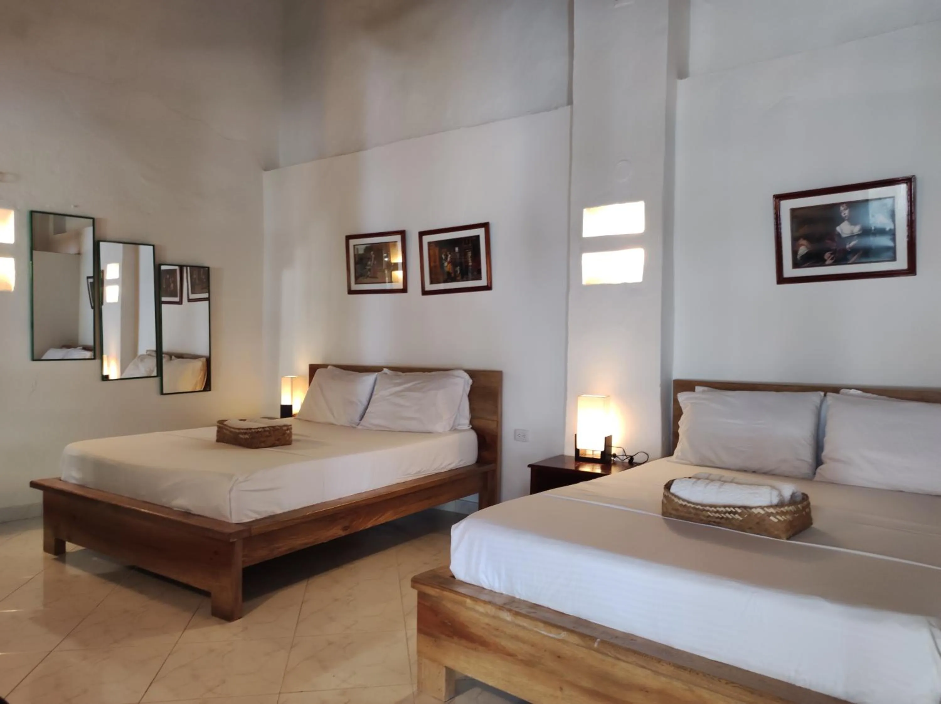 Photo of the whole room, Bed in HOTEL NIETO MOMPOX, ubicado en el corazón del centro histórico, frente al rio magdalena en zona de malecón