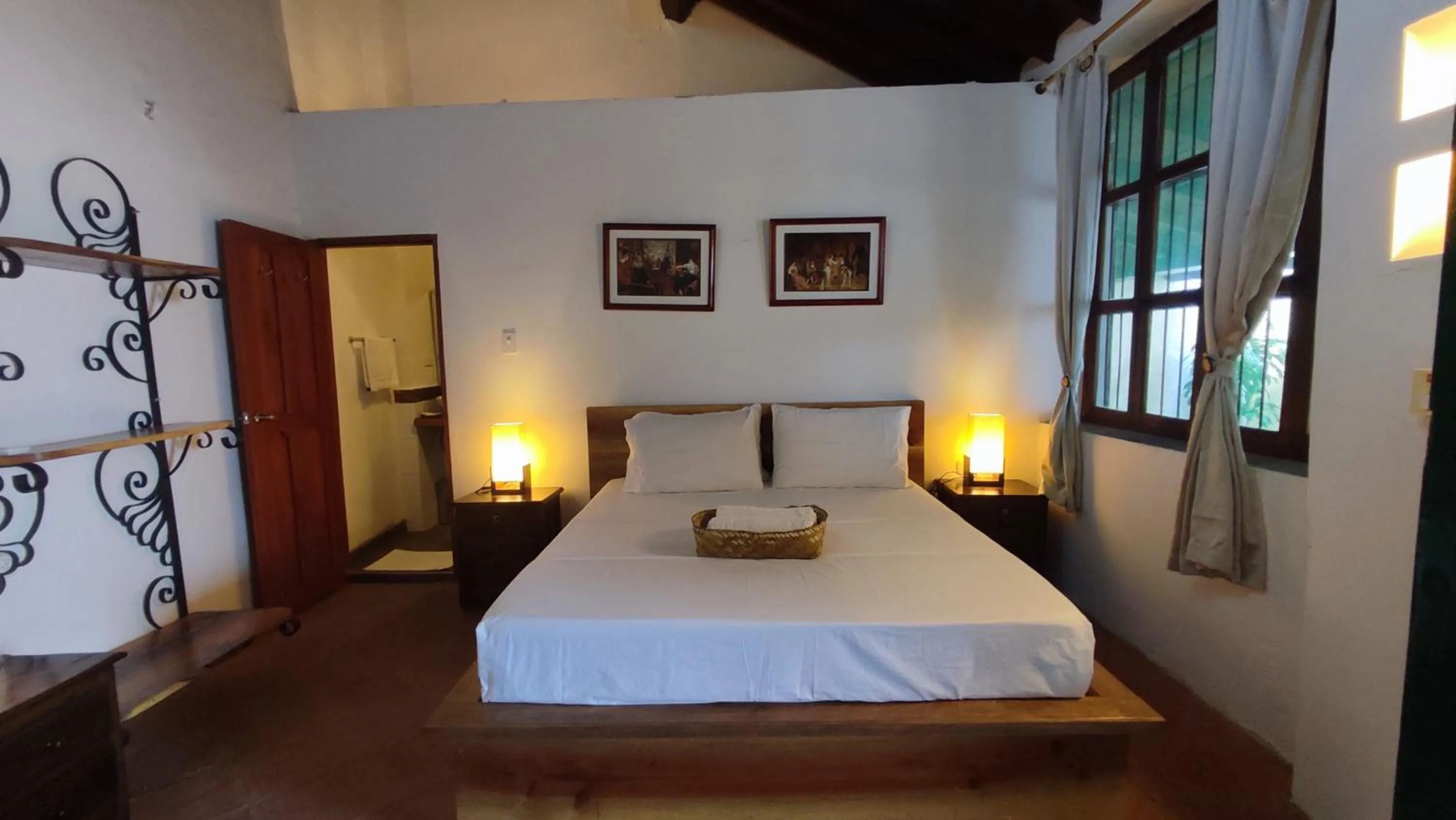 Bed in HOTEL NIETO MOMPOX, ubicado en el corazón del centro histórico, frente al rio magdalena en zona de malecón