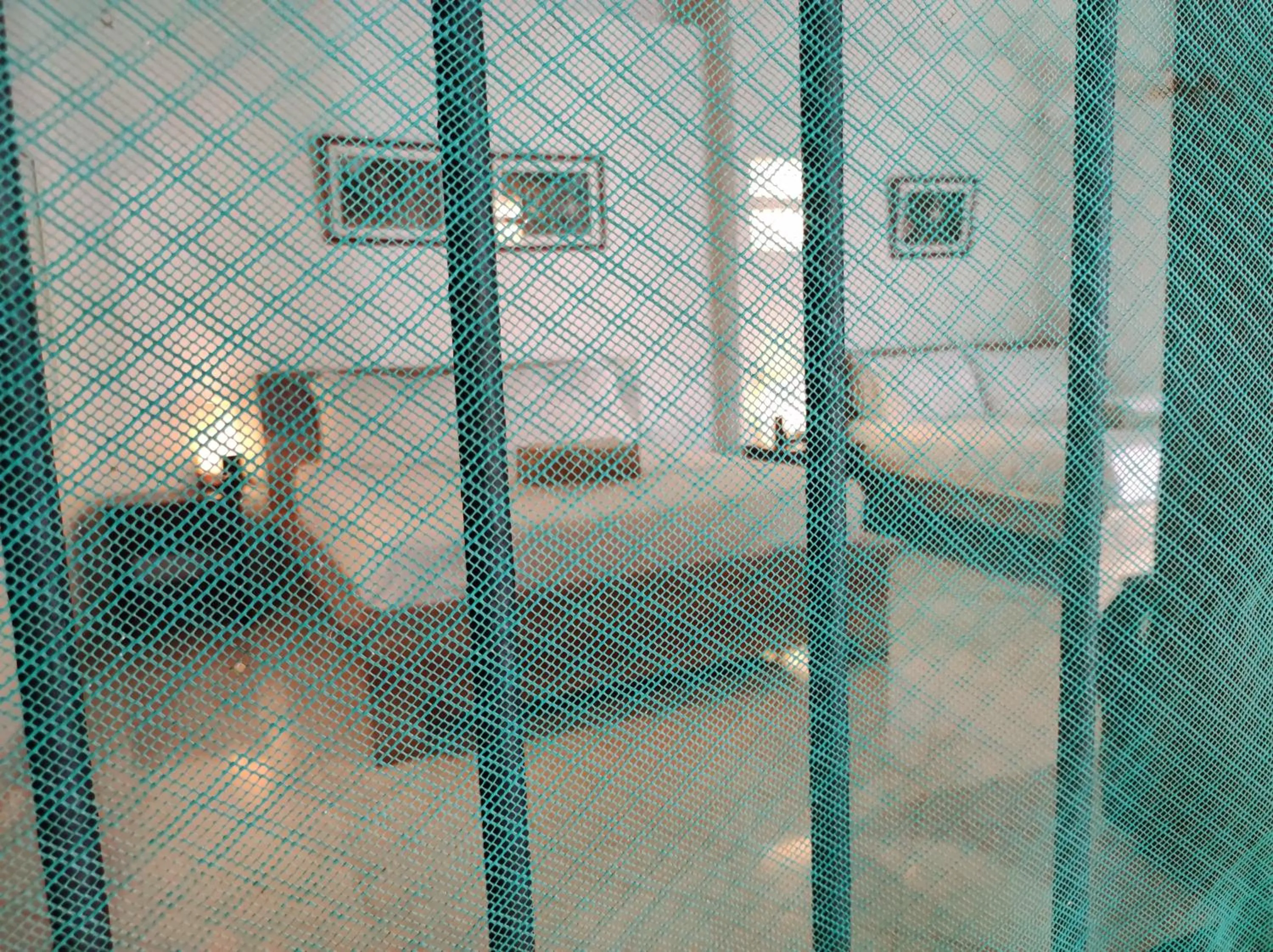 Photo of the whole room, Bed in HOTEL NIETO MOMPOX, ubicado en el corazón del centro histórico, frente al rio magdalena en zona de malecón