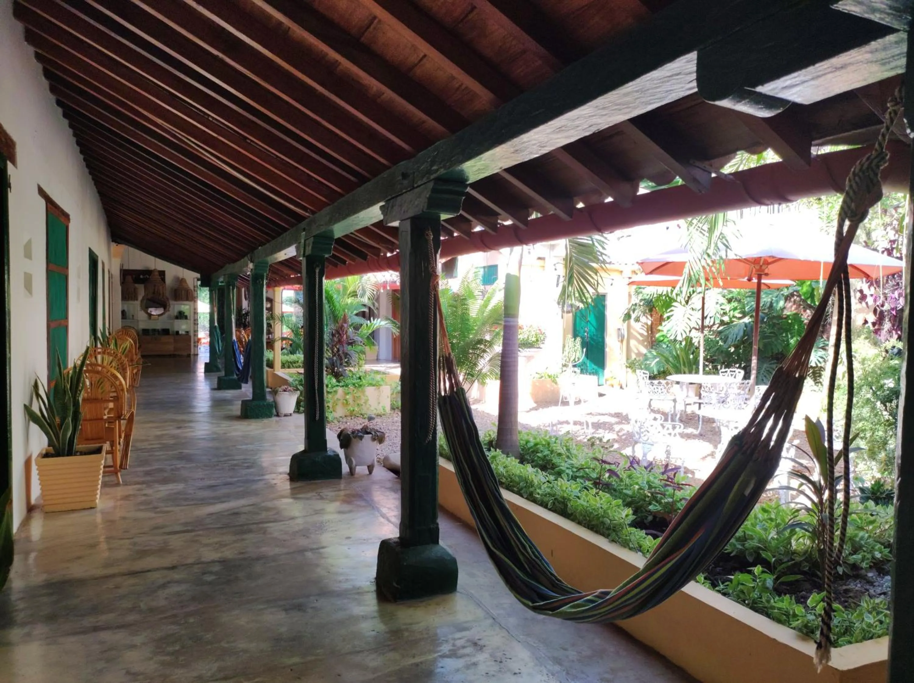 Garden in HOTEL NIETO MOMPOX, ubicado en el corazón del centro histórico, frente al rio magdalena en zona de malecón