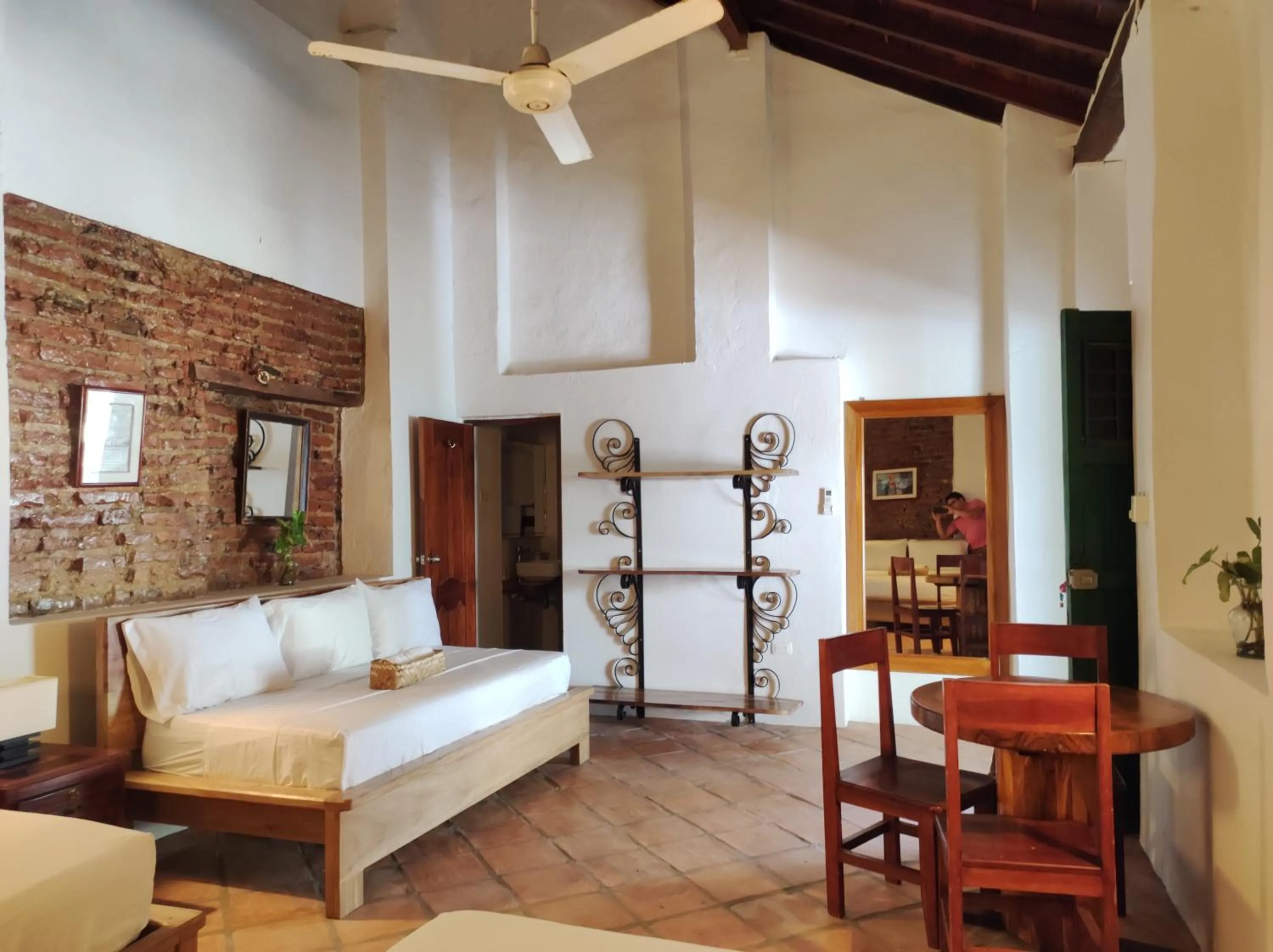 Bed in HOTEL NIETO MOMPOX, ubicado en el corazón del centro histórico, frente al rio magdalena en zona de malecón