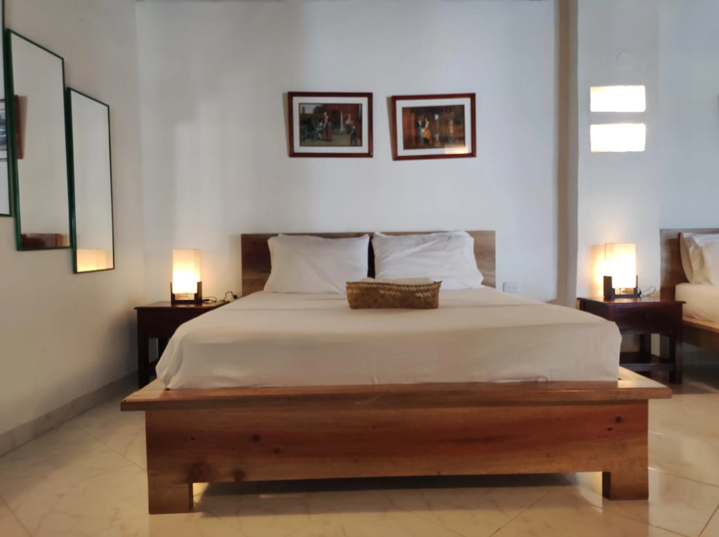 Bed in HOTEL NIETO MOMPOX, ubicado en el corazón del centro histórico, frente al rio magdalena en zona de malecón