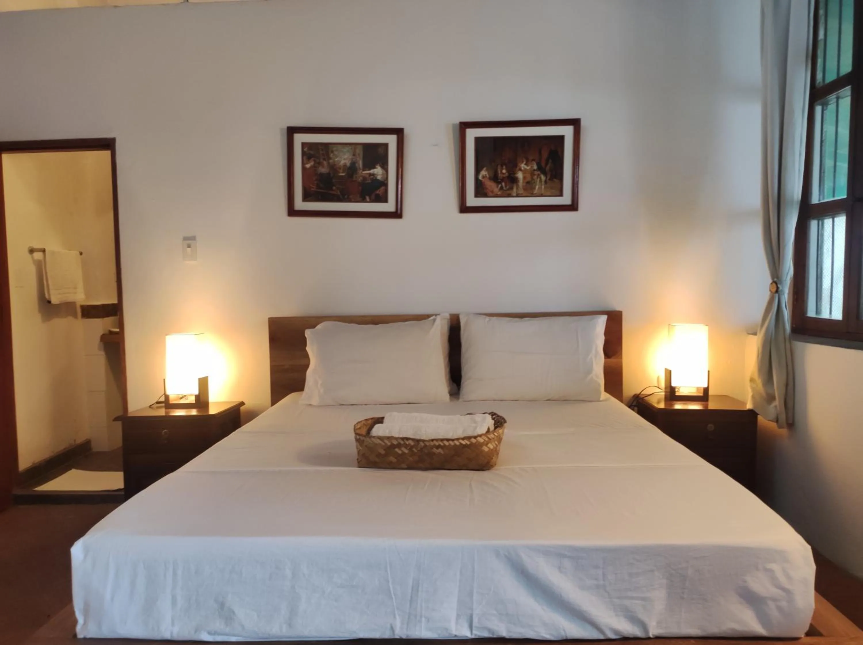 Bed in HOTEL NIETO MOMPOX, ubicado en el corazón del centro histórico, frente al rio magdalena en zona de malecón