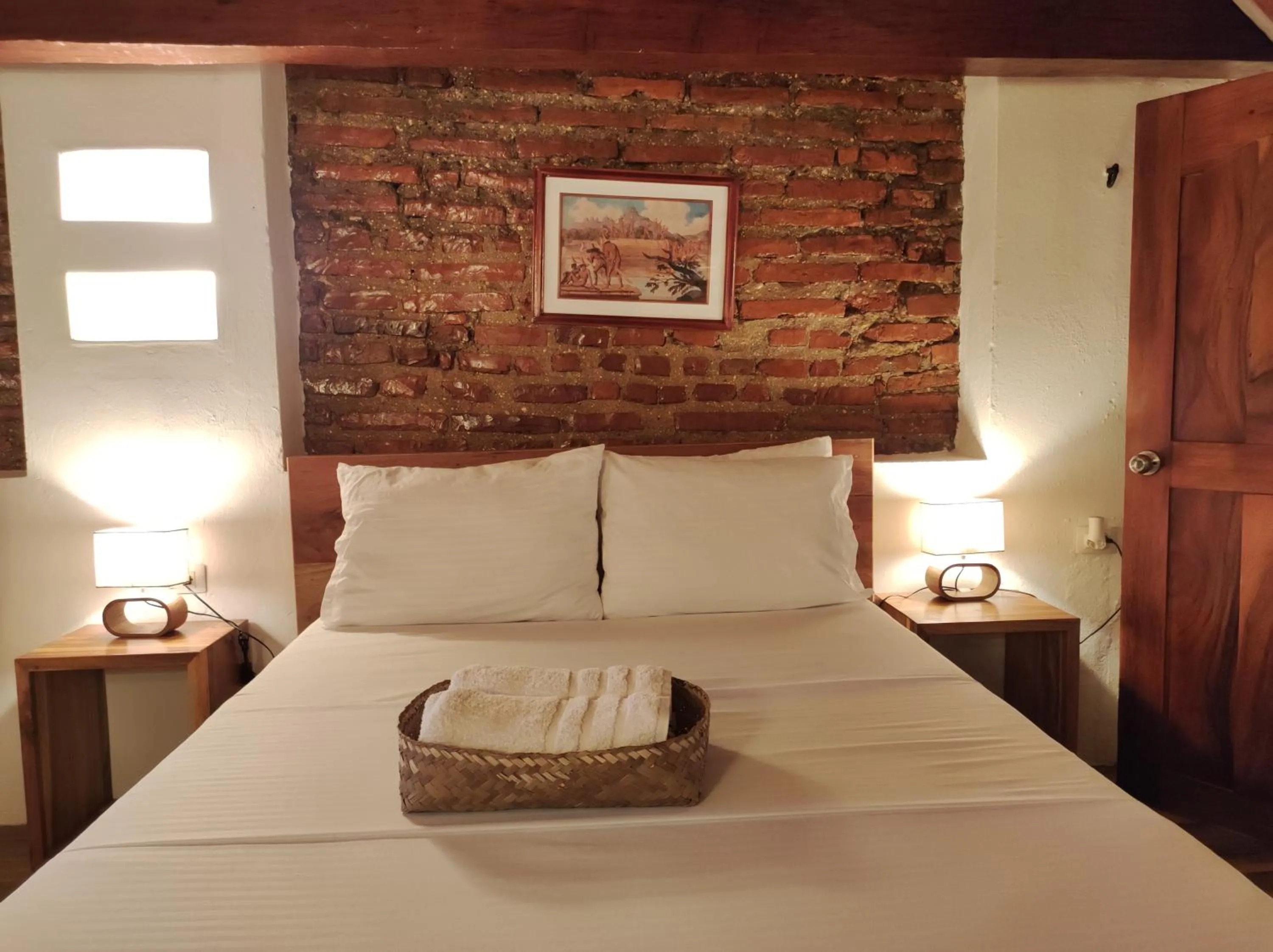 Bed in HOTEL NIETO MOMPOX, ubicado en el corazón del centro histórico, frente al rio magdalena en zona de malecón