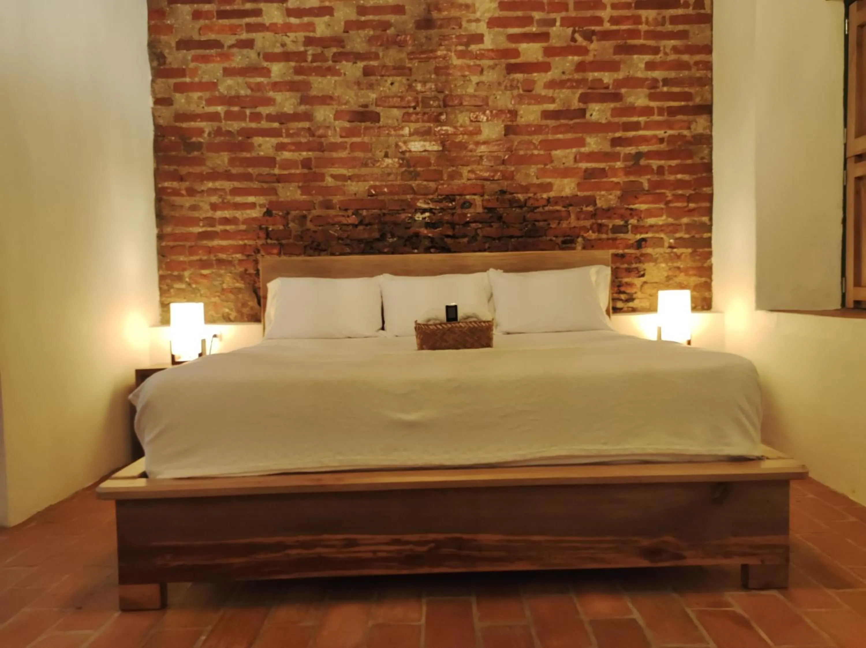 Bed in HOTEL NIETO MOMPOX, ubicado en el corazón del centro histórico, frente al rio magdalena en zona de malecón