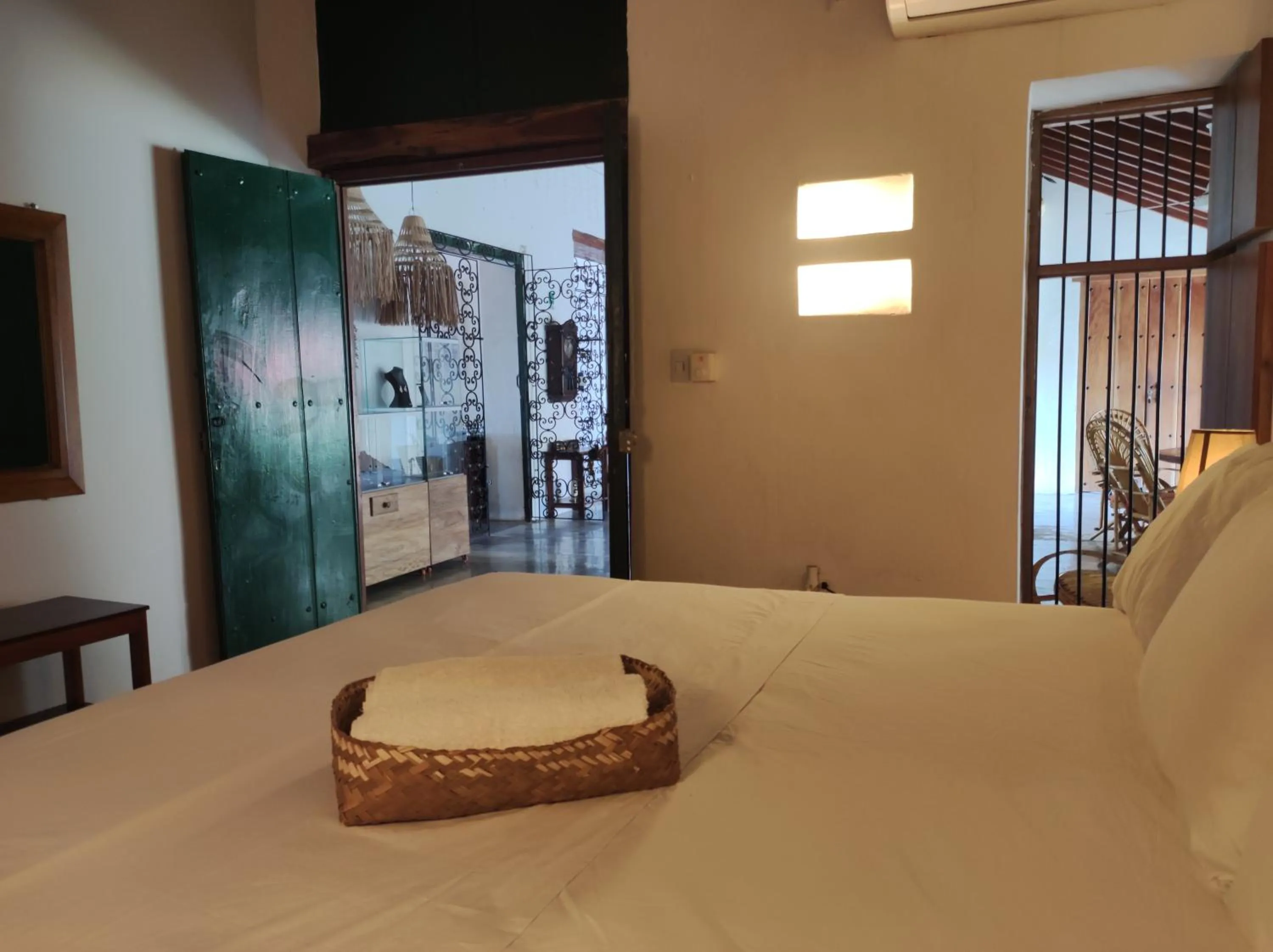 Bed in HOTEL NIETO MOMPOX, ubicado en el corazón del centro histórico, frente al rio magdalena en zona de malecón