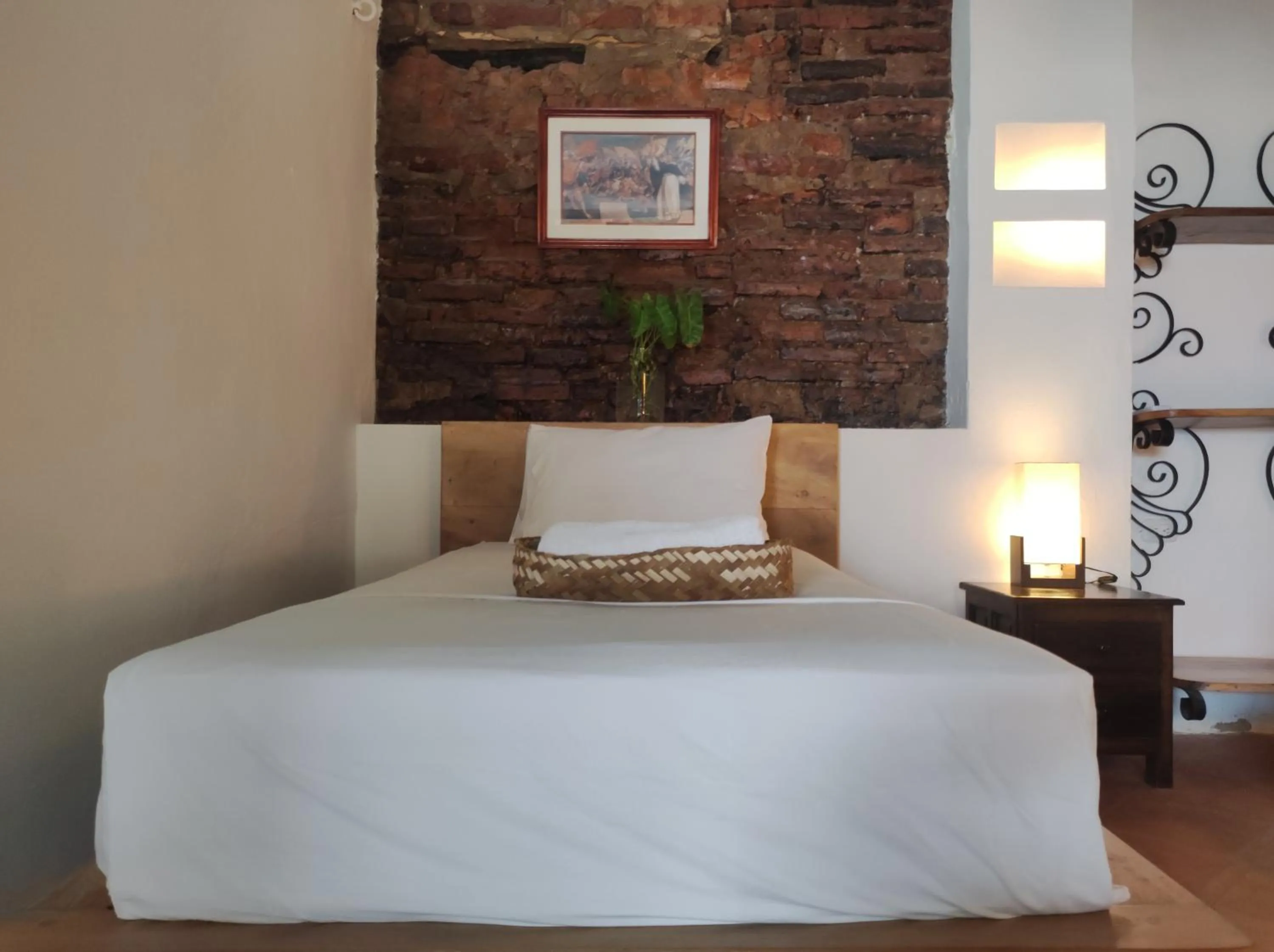 Bed in HOTEL NIETO MOMPOX, ubicado en el corazón del centro histórico, frente al rio magdalena en zona de malecón