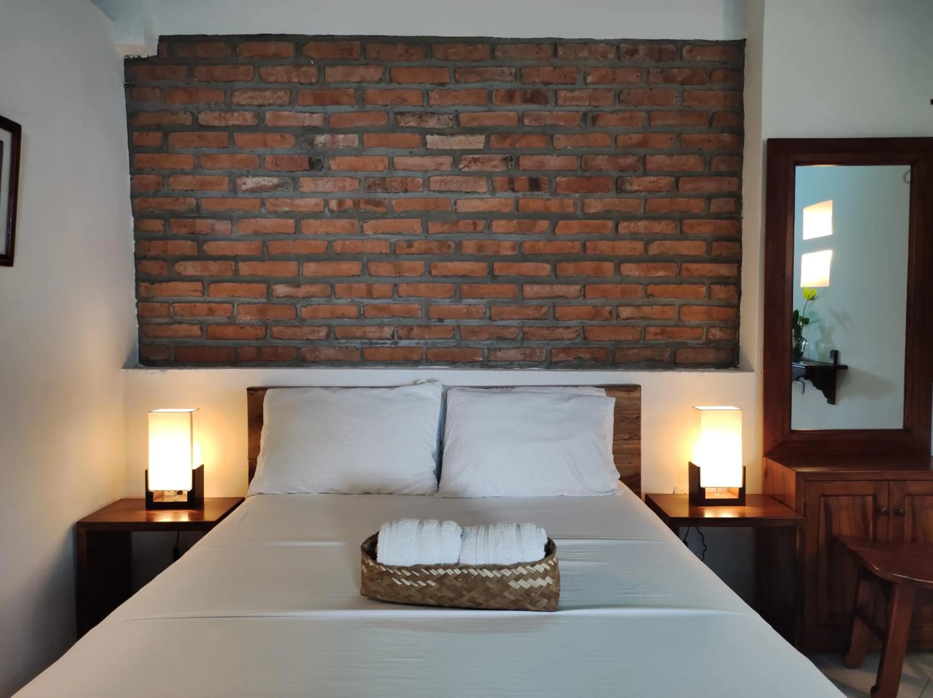 Bed in HOTEL NIETO MOMPOX, ubicado en el corazón del centro histórico, frente al rio magdalena en zona de malecón