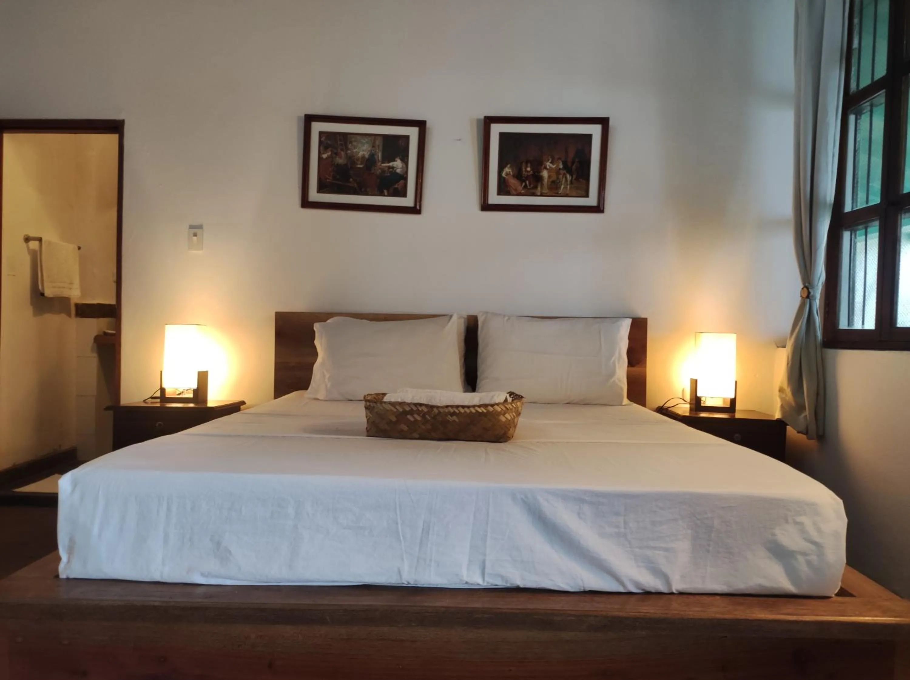Bed in HOTEL NIETO MOMPOX, ubicado en el corazón del centro histórico, frente al rio magdalena en zona de malecón