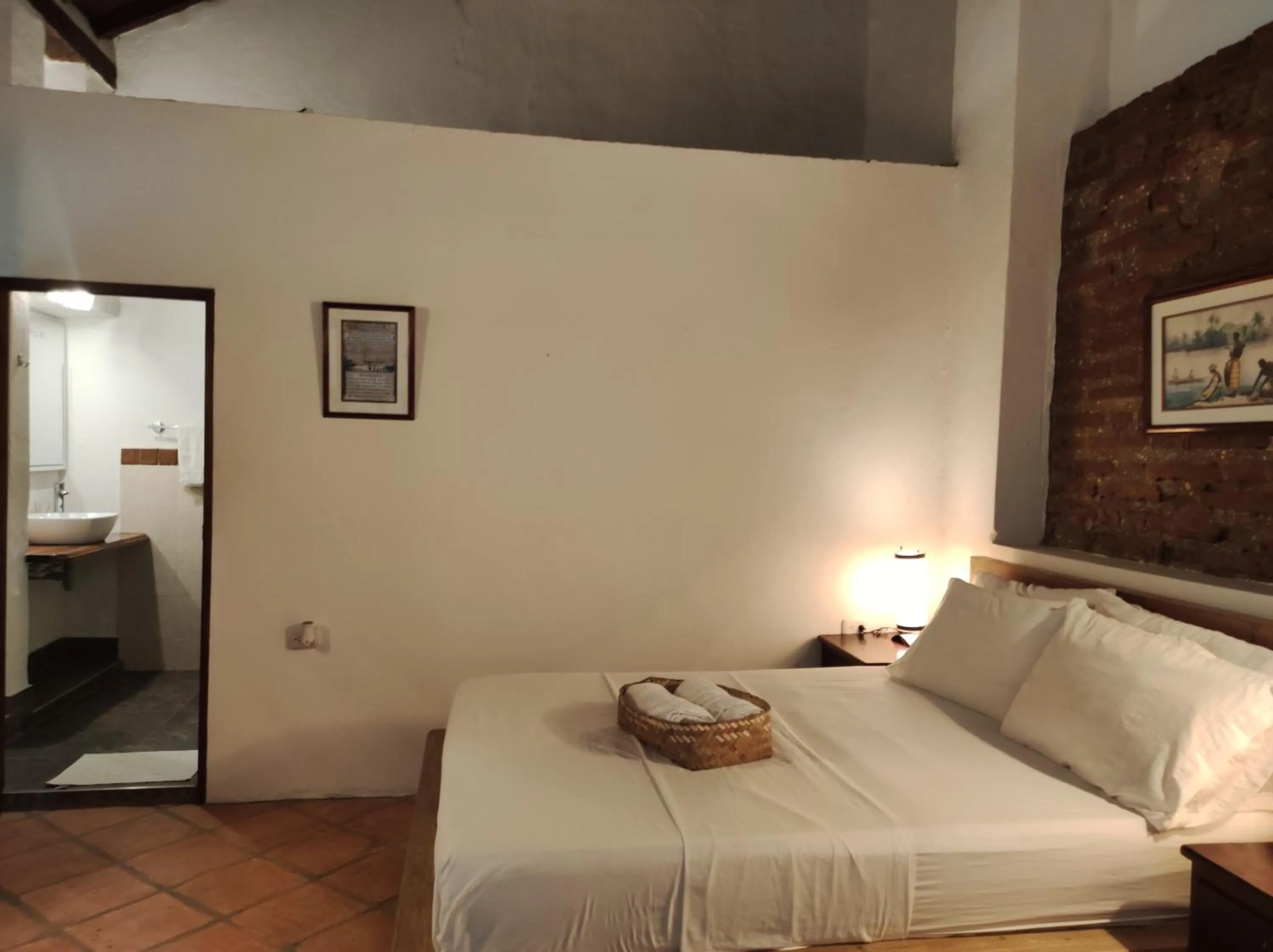 Bed in HOTEL NIETO MOMPOX, ubicado en el corazón del centro histórico, frente al rio magdalena en zona de malecón