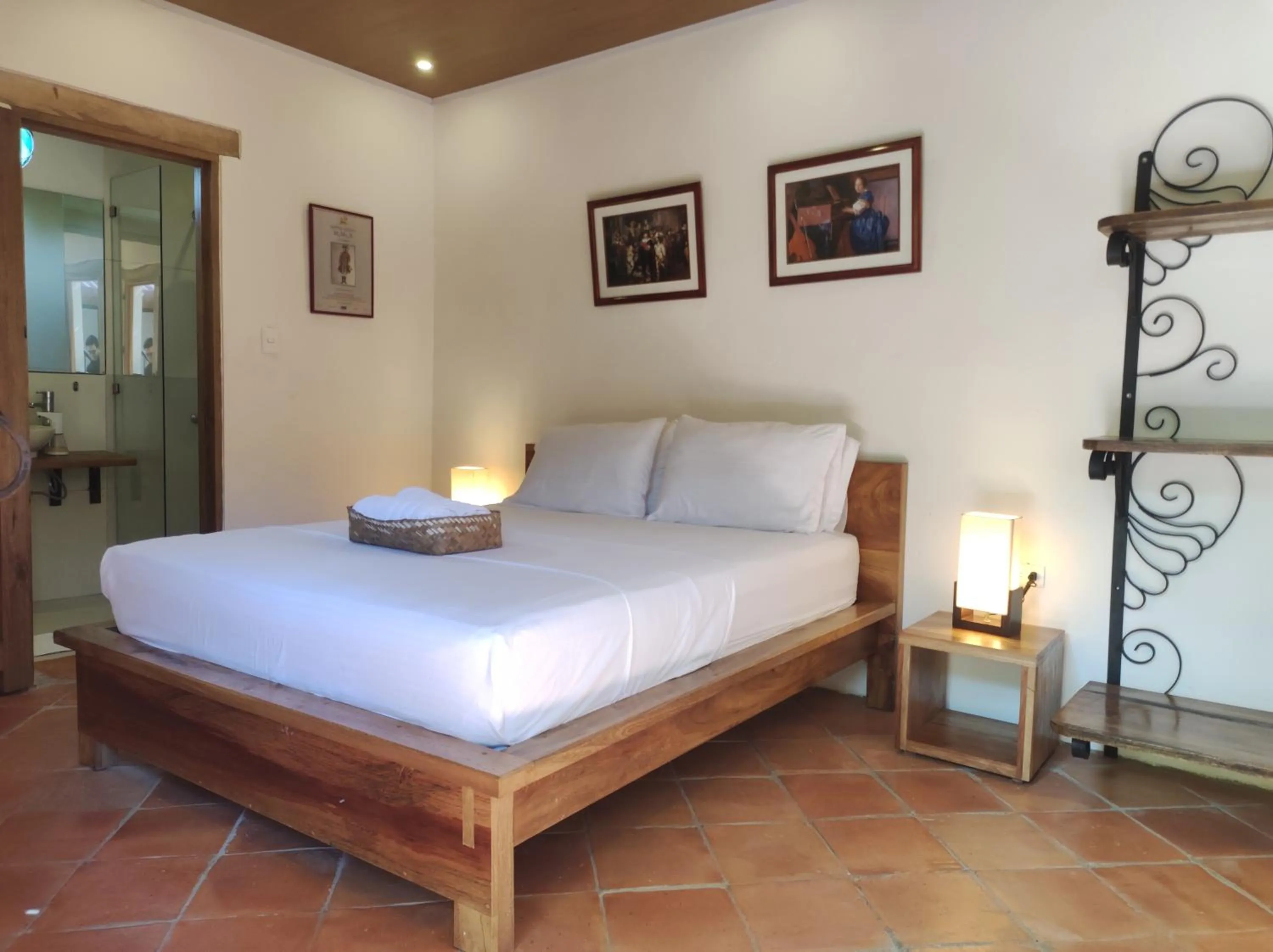 Bed in HOTEL NIETO MOMPOX, ubicado en el corazón del centro histórico, frente al rio magdalena en zona de malecón