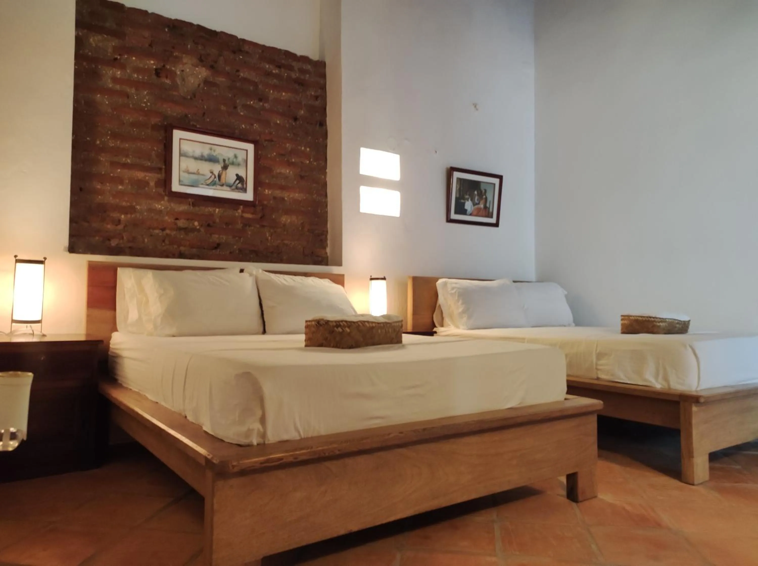 Bed in HOTEL NIETO MOMPOX, ubicado en el corazón del centro histórico, frente al rio magdalena en zona de malecón