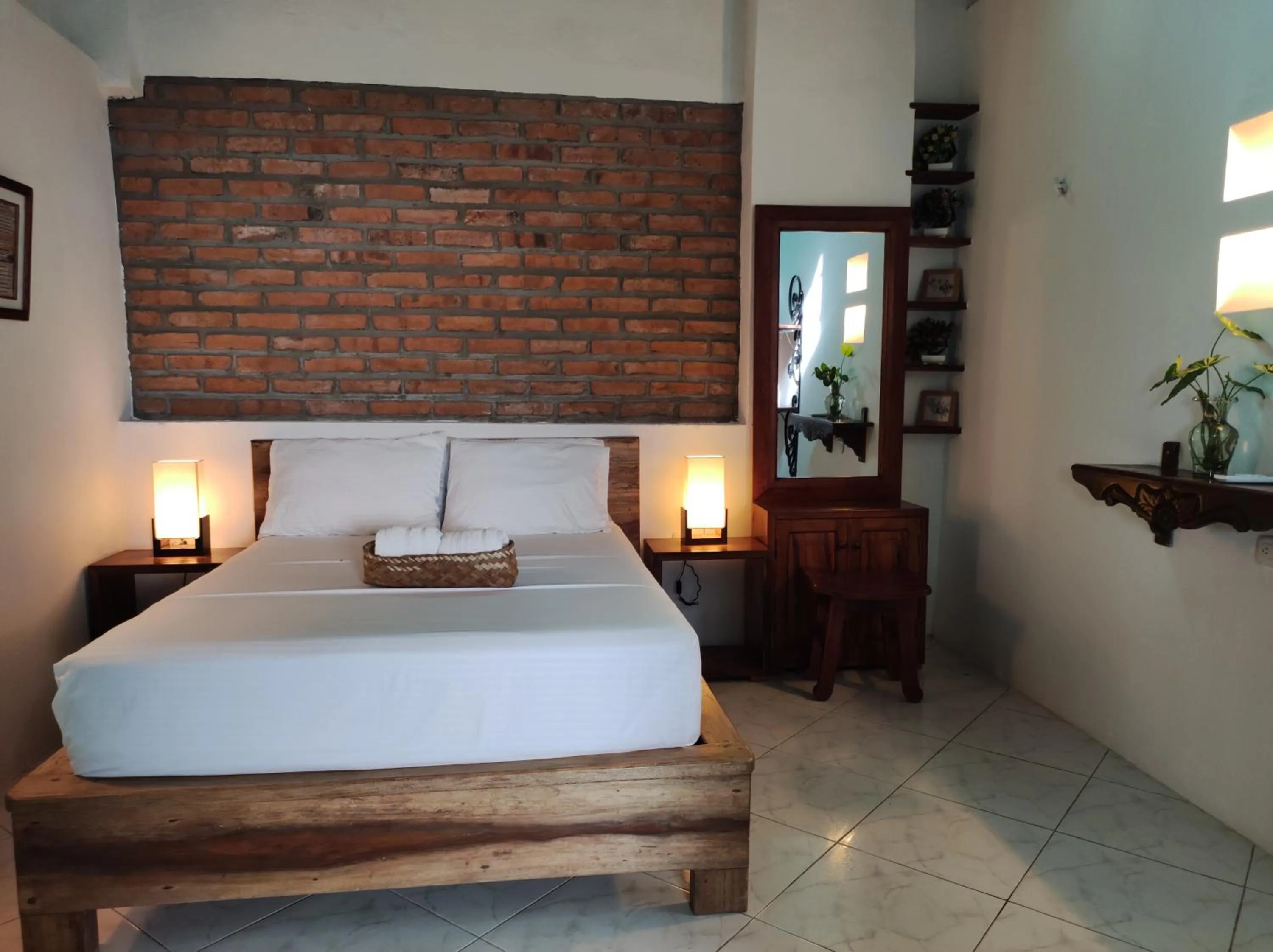 Bed in HOTEL NIETO MOMPOX, ubicado en el corazón del centro histórico, frente al rio magdalena en zona de malecón