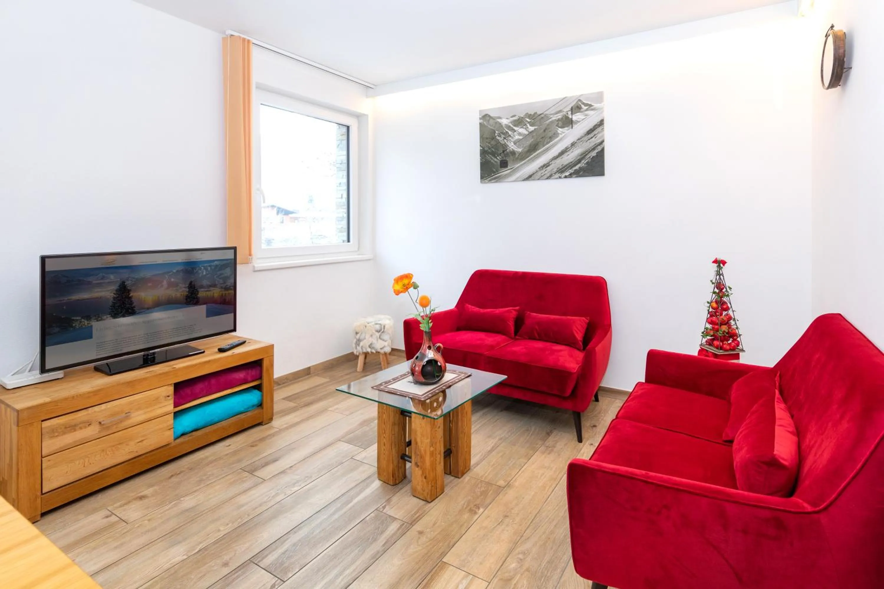 Living room in Appartement Living Schönwies apartments with private Infrared cabin and Zell am See Kaprun summercard