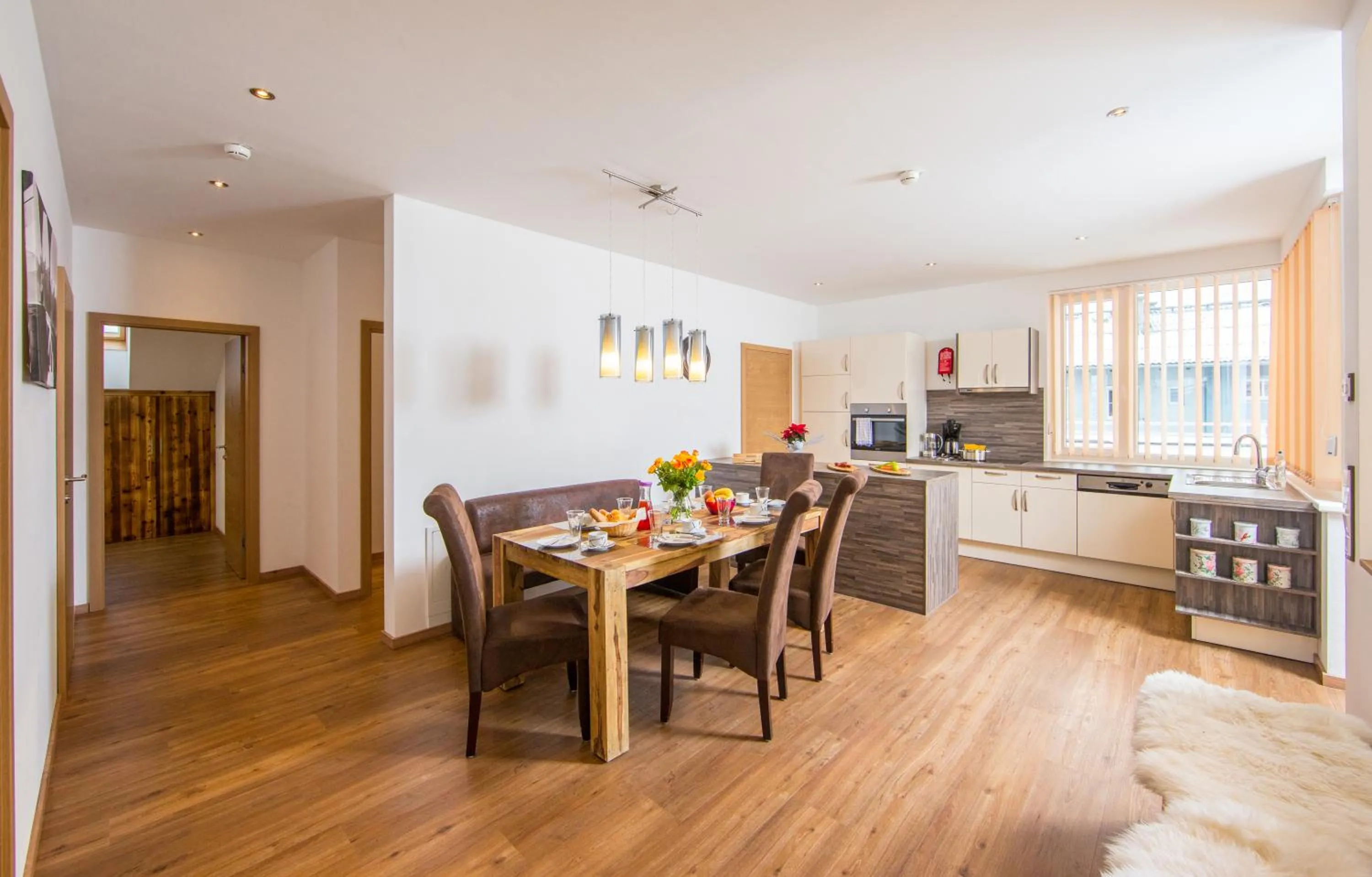 Kitchen or kitchenette in Appartement Living Schönwies apartments with private Infrared cabin and Zell am See Kaprun summercard