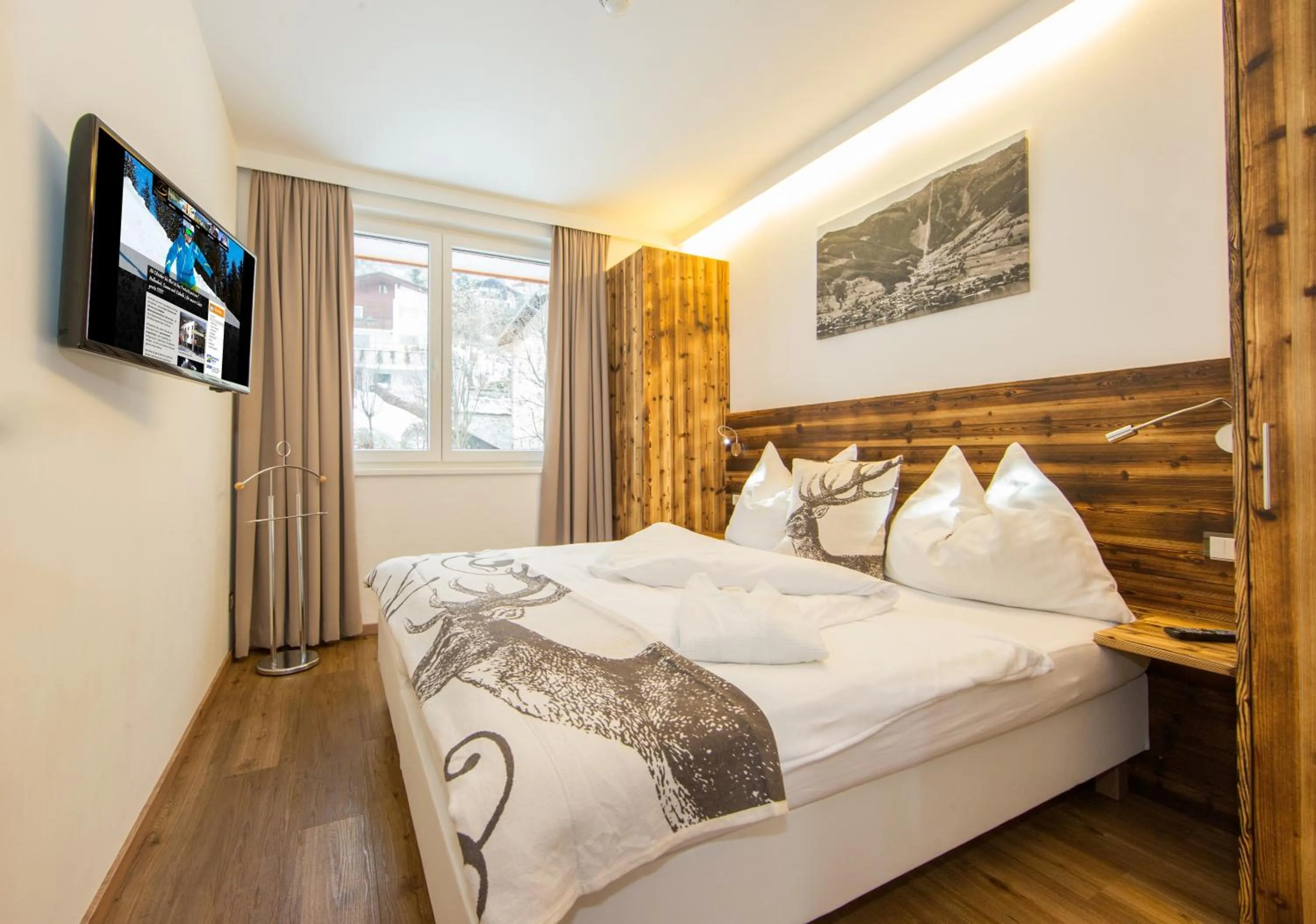 Bedroom, Bed in Appartement Living Schönwies apartments with private Infrared cabin and Zell am See Kaprun summercard