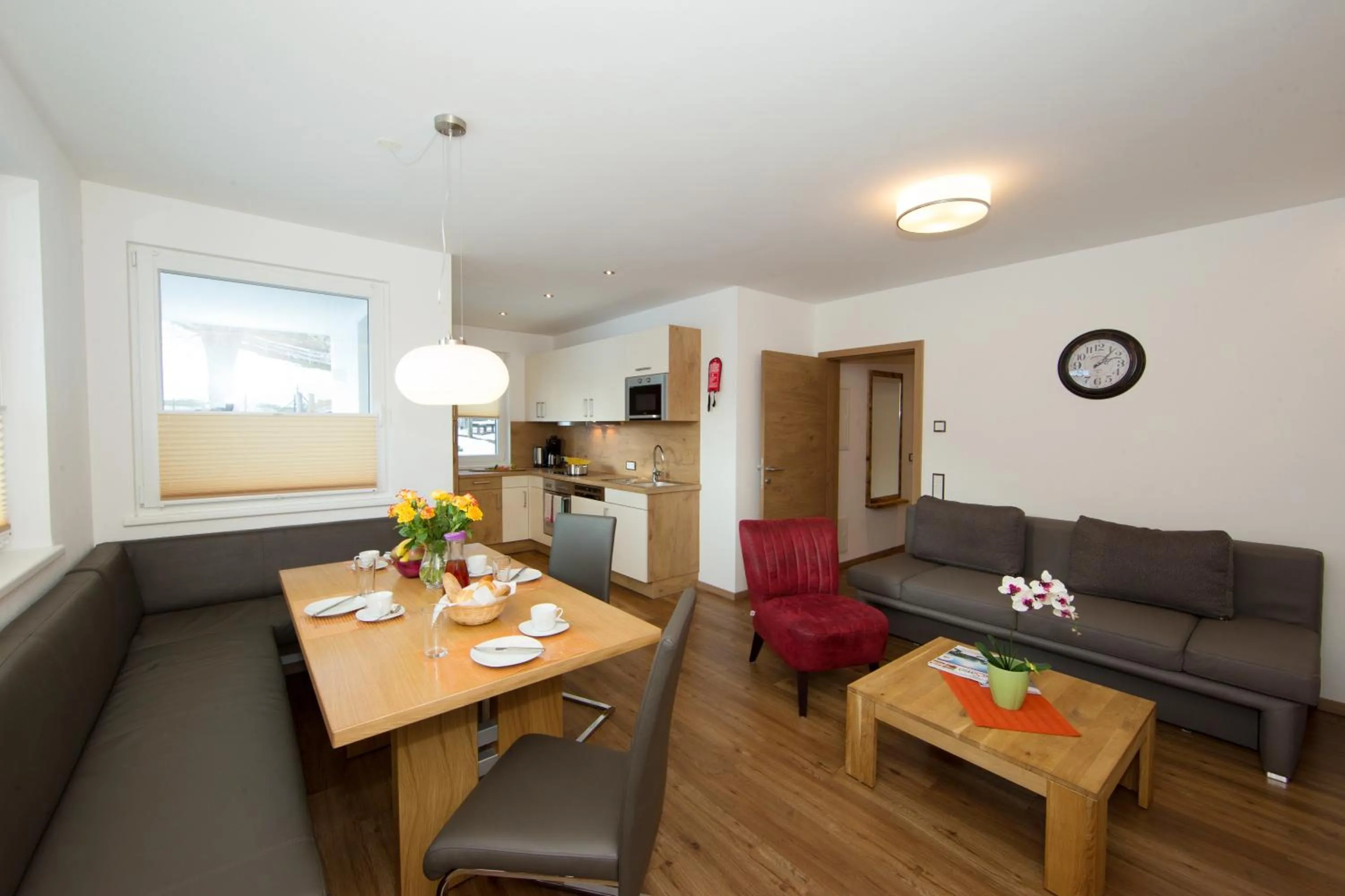 Kitchen or kitchenette in Appartement Living Schönwies apartments with private Infrared cabin and Zell am See Kaprun summercard