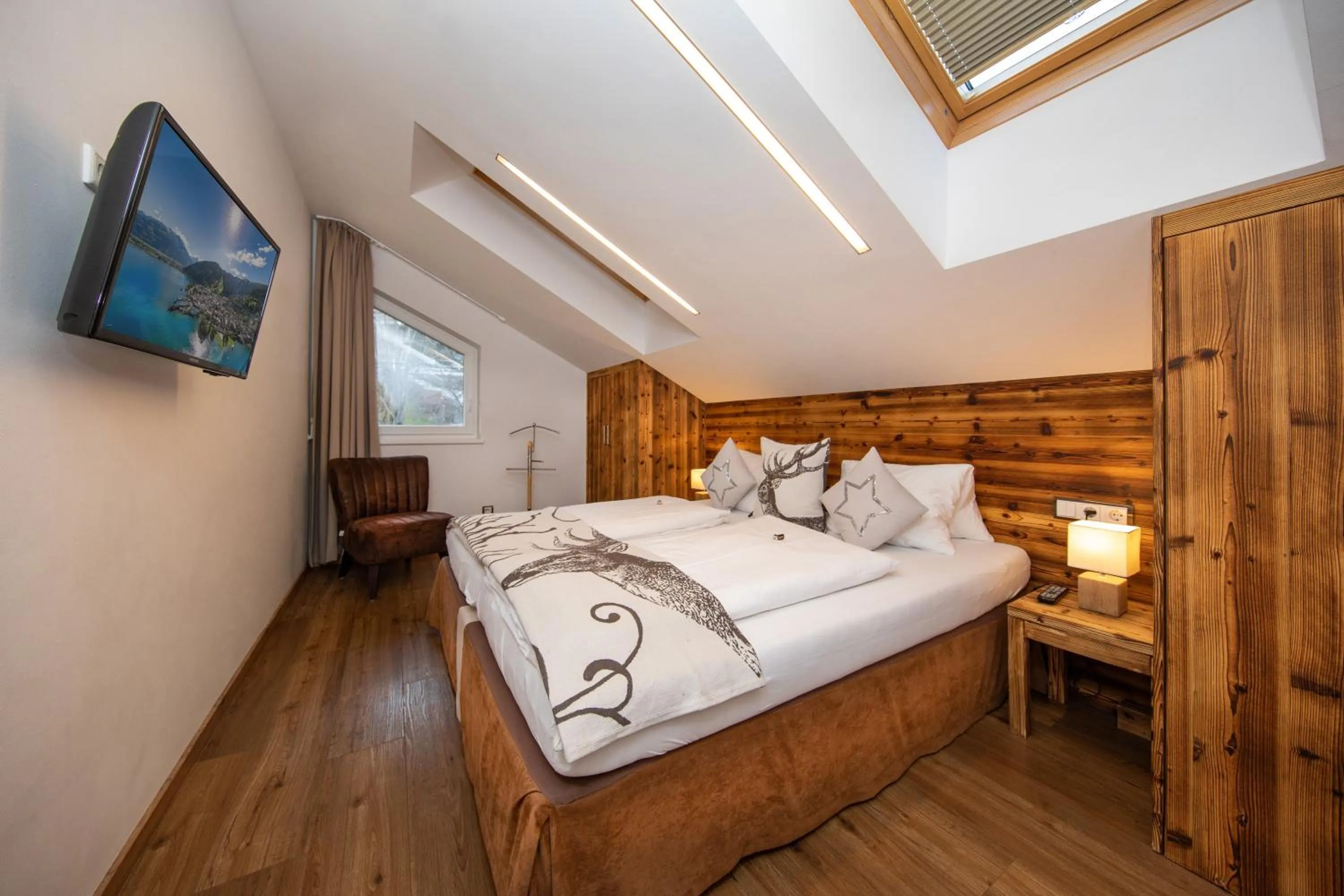 Bedroom, Bed in Appartement Living Schönwies apartments with private Infrared cabin and Zell am See Kaprun summercard