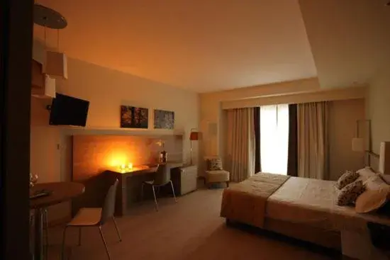 Photo of the whole room, Bed in Turin Airport Hotel & Residence Photo of the whole room, Bed in Turin Airport Hotel & Residence