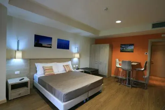 Photo of the whole room, Bed in Turin Airport Hotel & Residence Photo of the whole room, Bed in Turin Airport Hotel & Residence