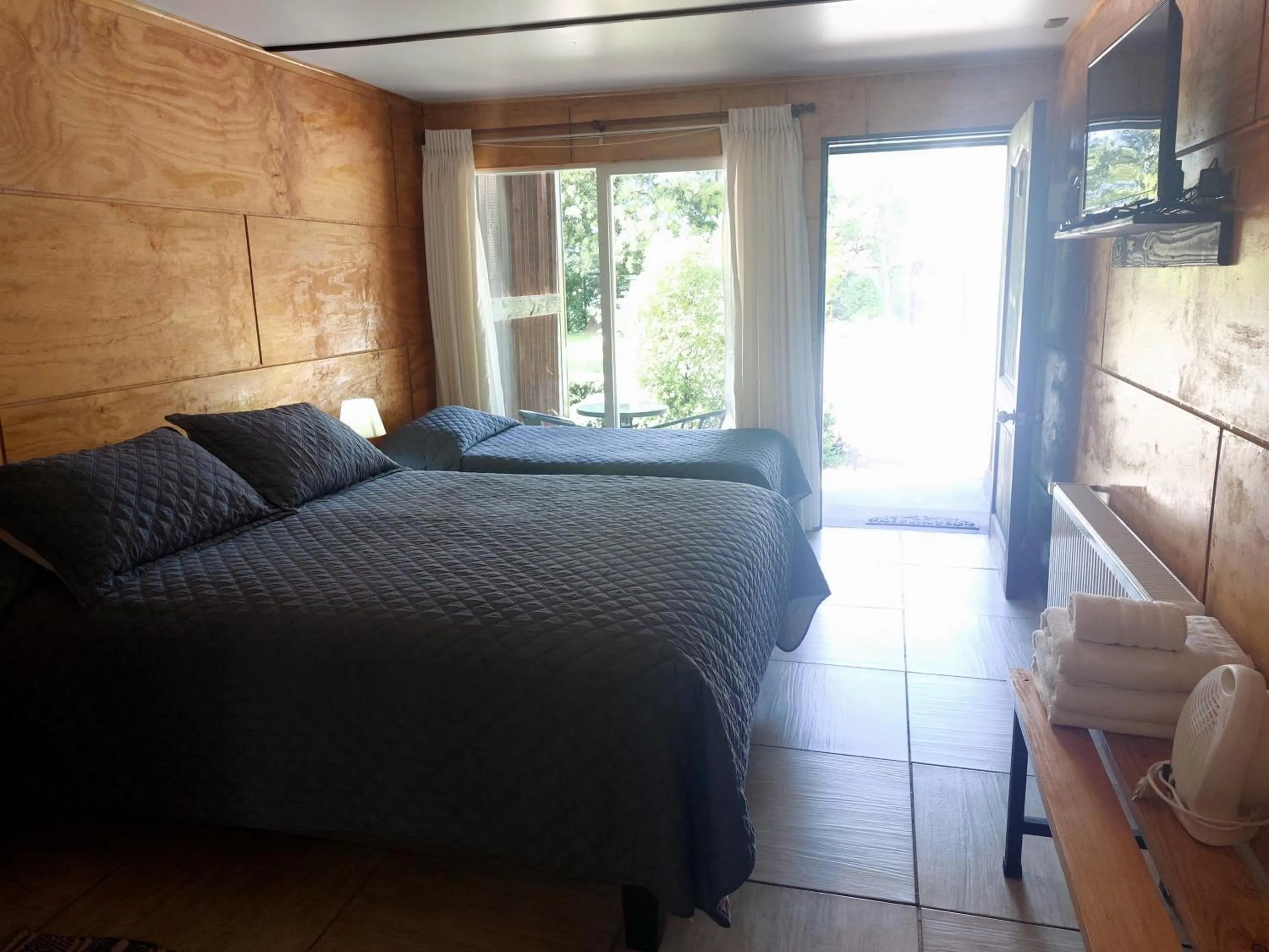 Bed in Verdevida Apart Hotel