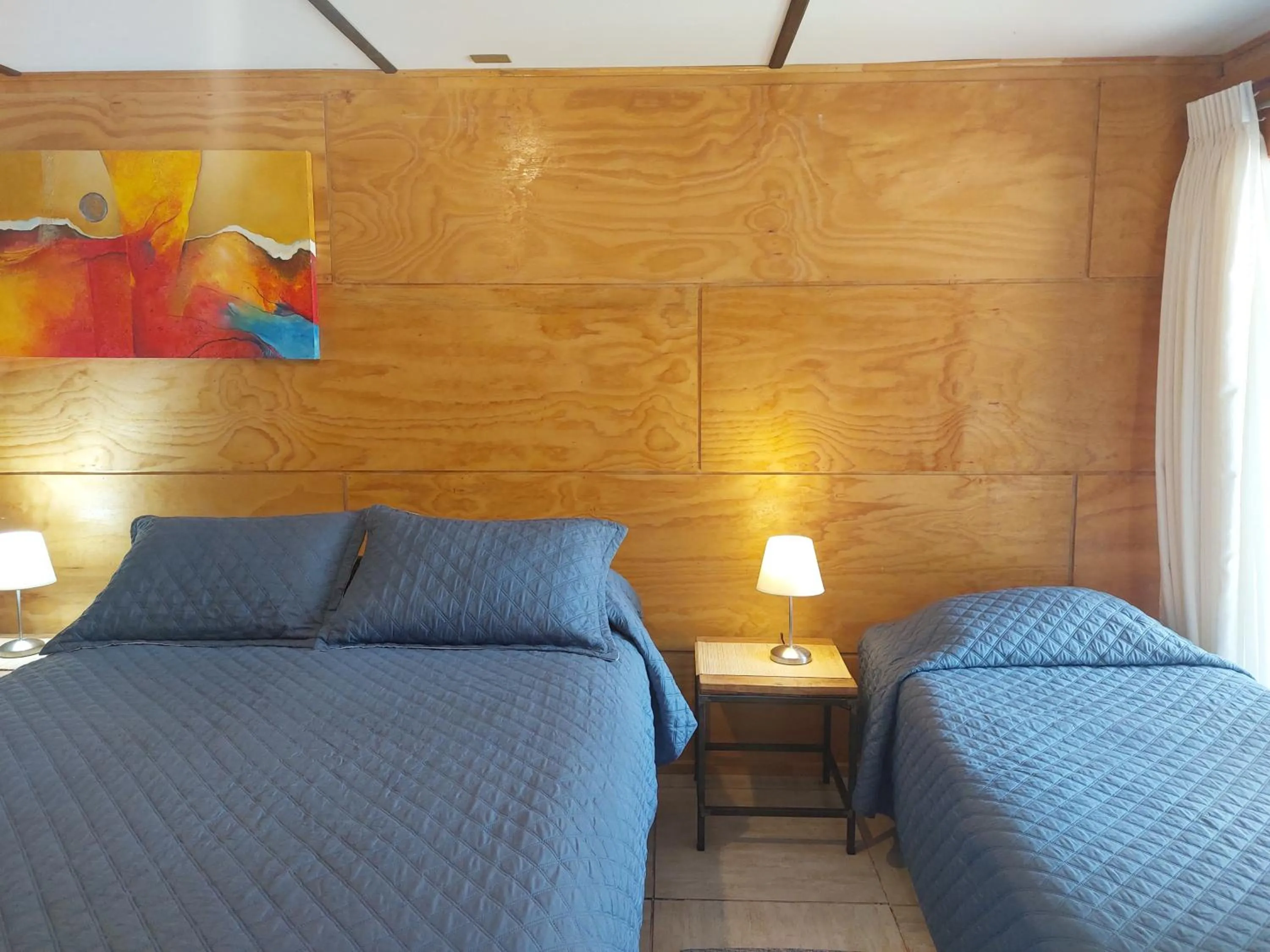 Bed in Verdevida Apart Hotel