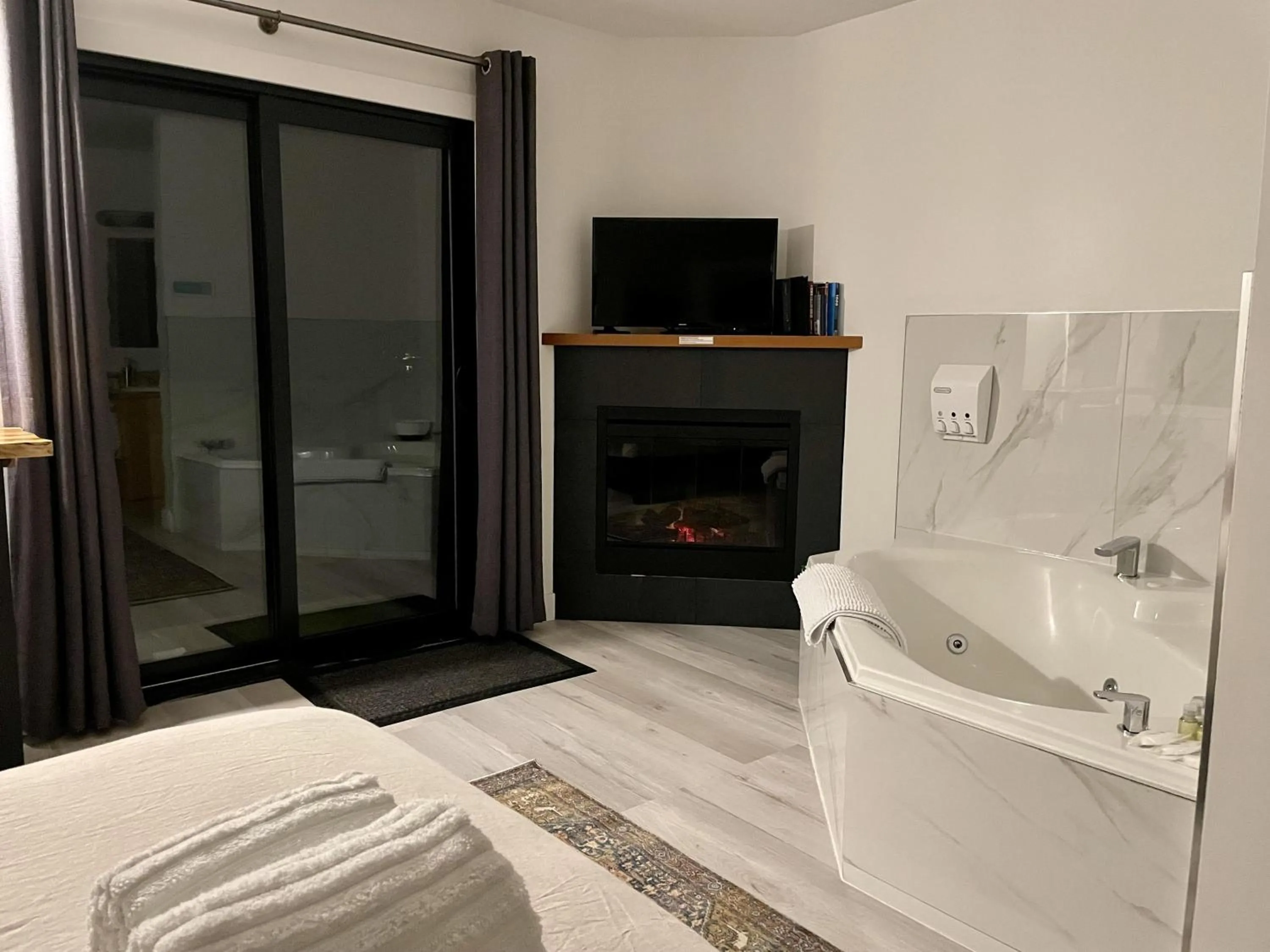 Property building, Bed in Oceanfront Room With Hot Tub & Firepit