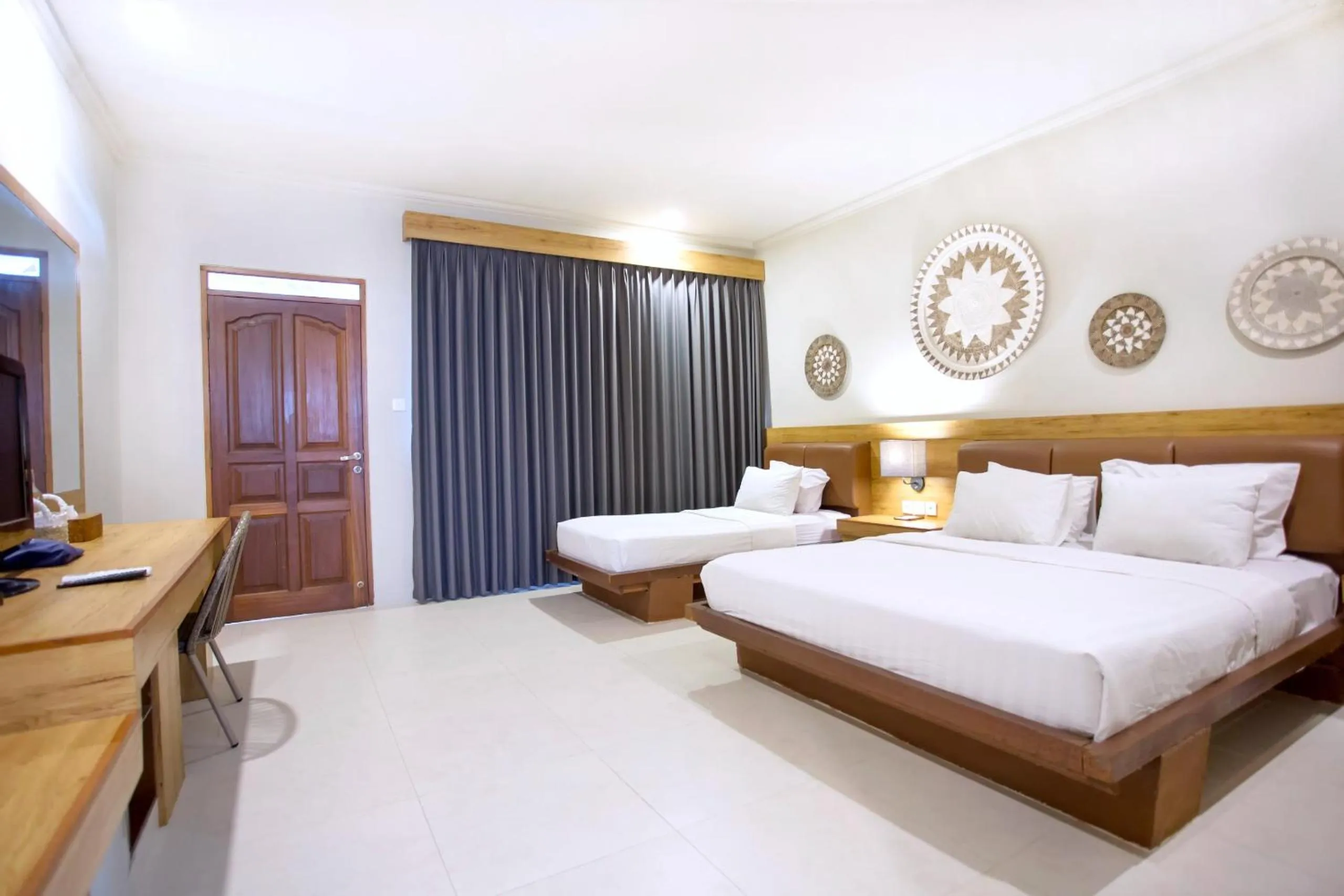 Bed in Mutiara Bali Boutique Resort & Villa