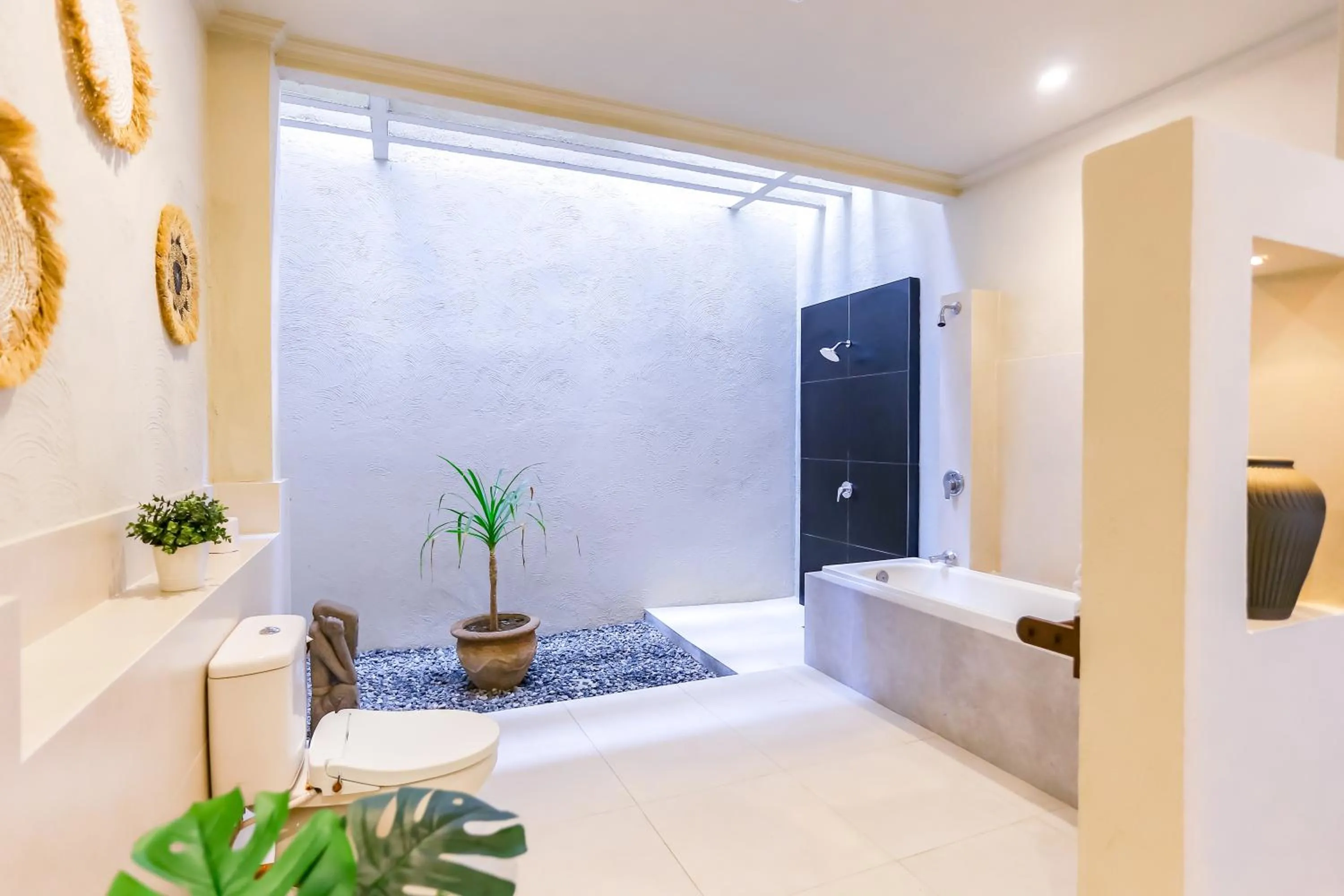 Shower, Bed in Mutiara Bali Boutique Resort & Villa