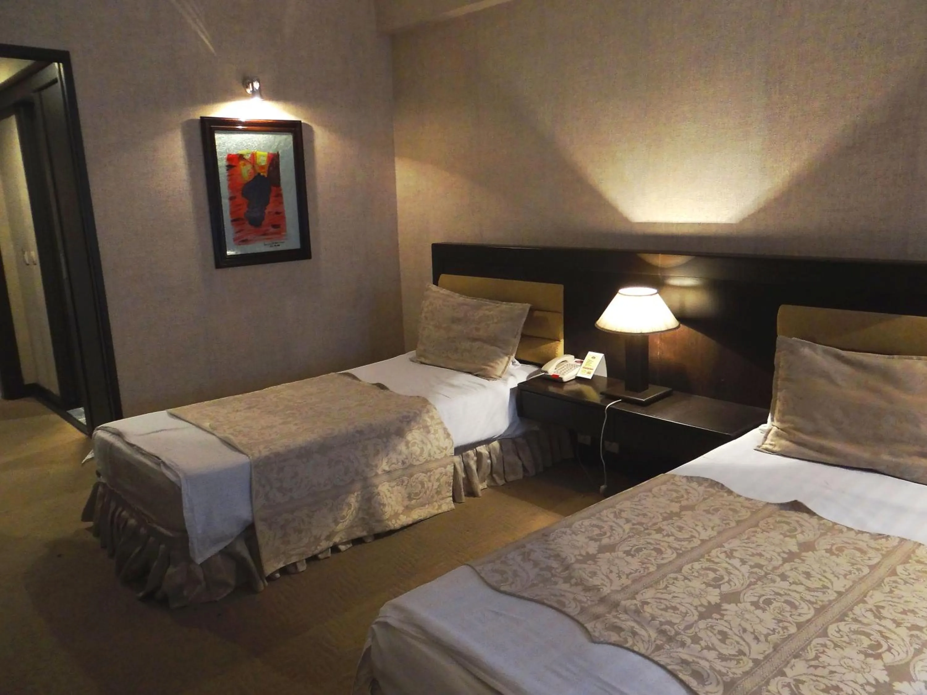 Decorative detail, Bed in Le Grande Plaza Hotel